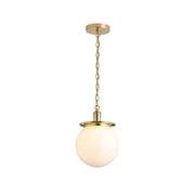 Nolan Globe Pendant Lamp with brass finish and white glass shade.