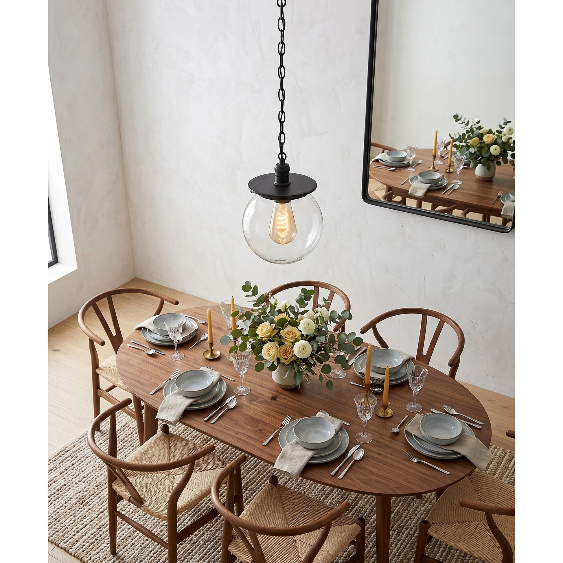 Nolan Globe Pendant with a clear glass shade option.