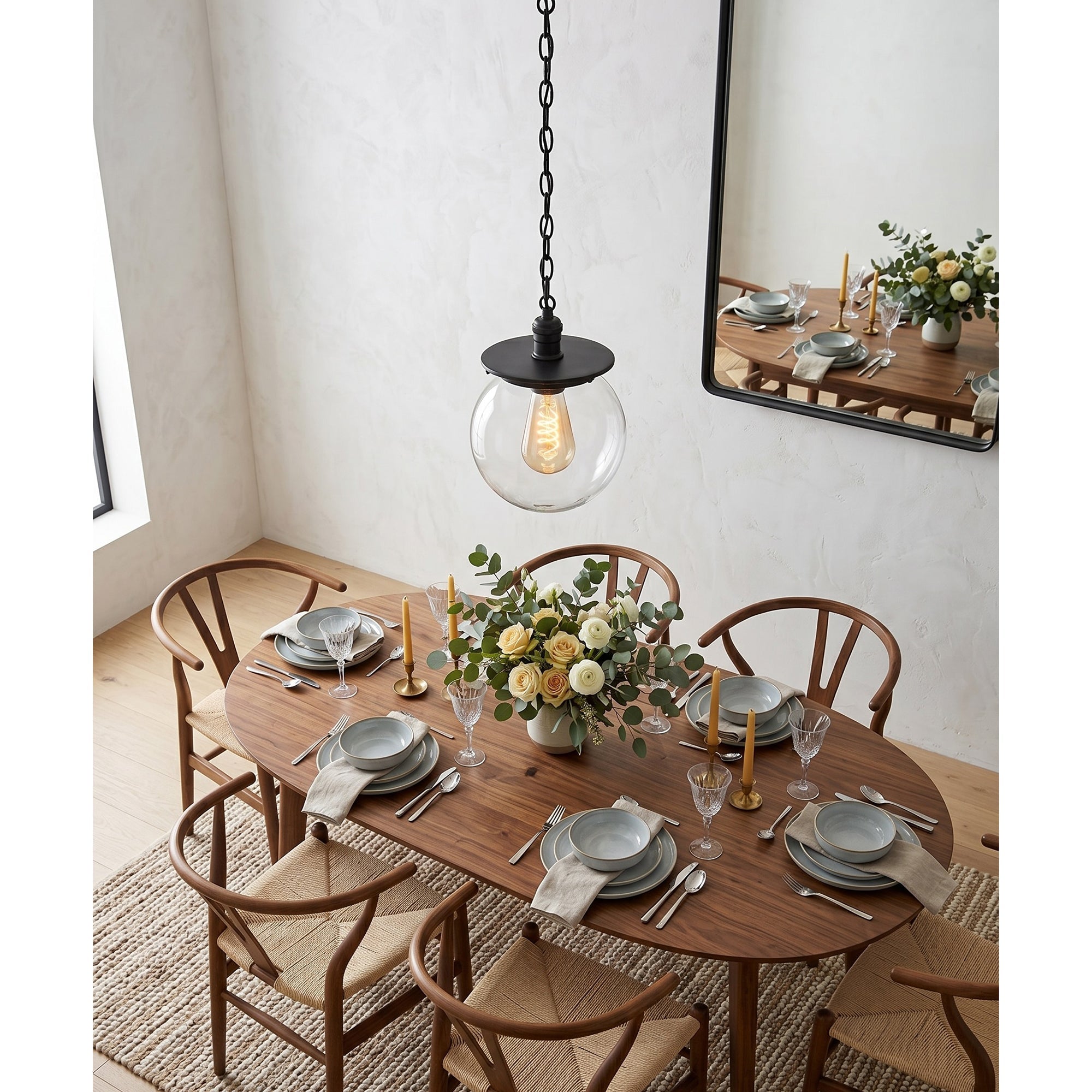 Nolan Globe Pendant with a clear glass shade option.