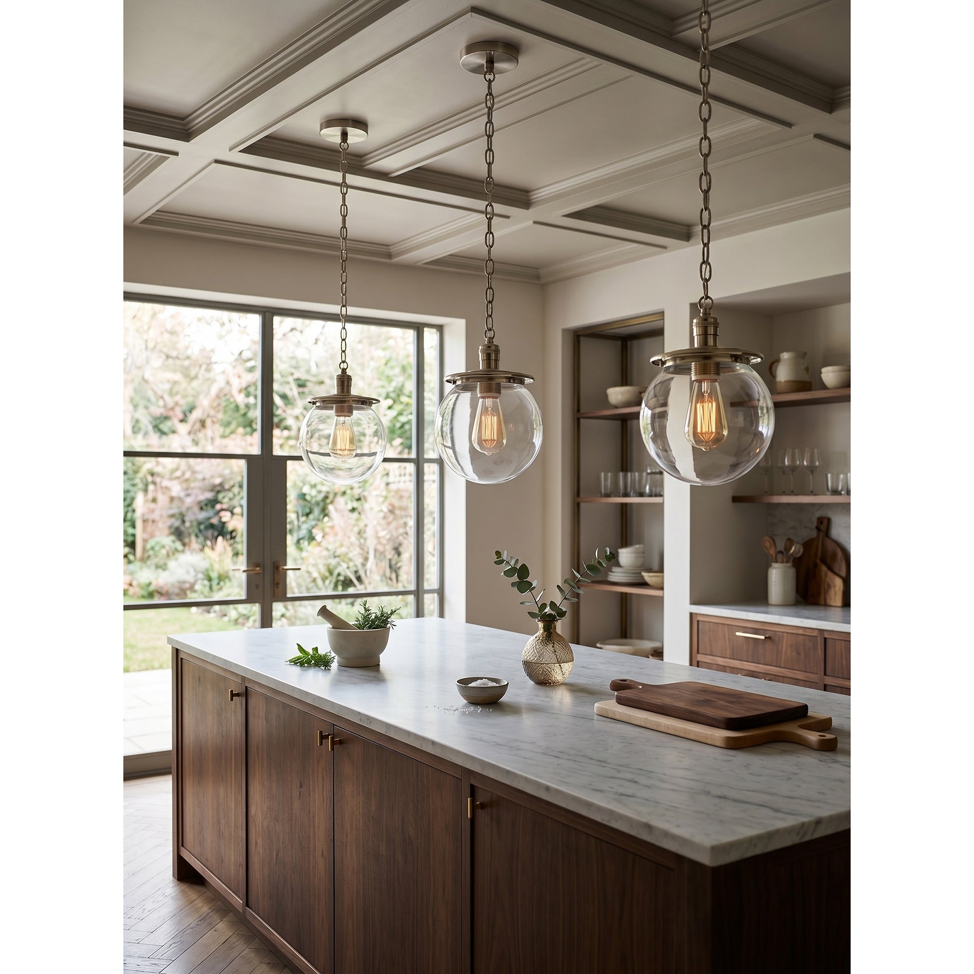 The warm glow from the Nolan Globe Pendant Lamp in an entryway.