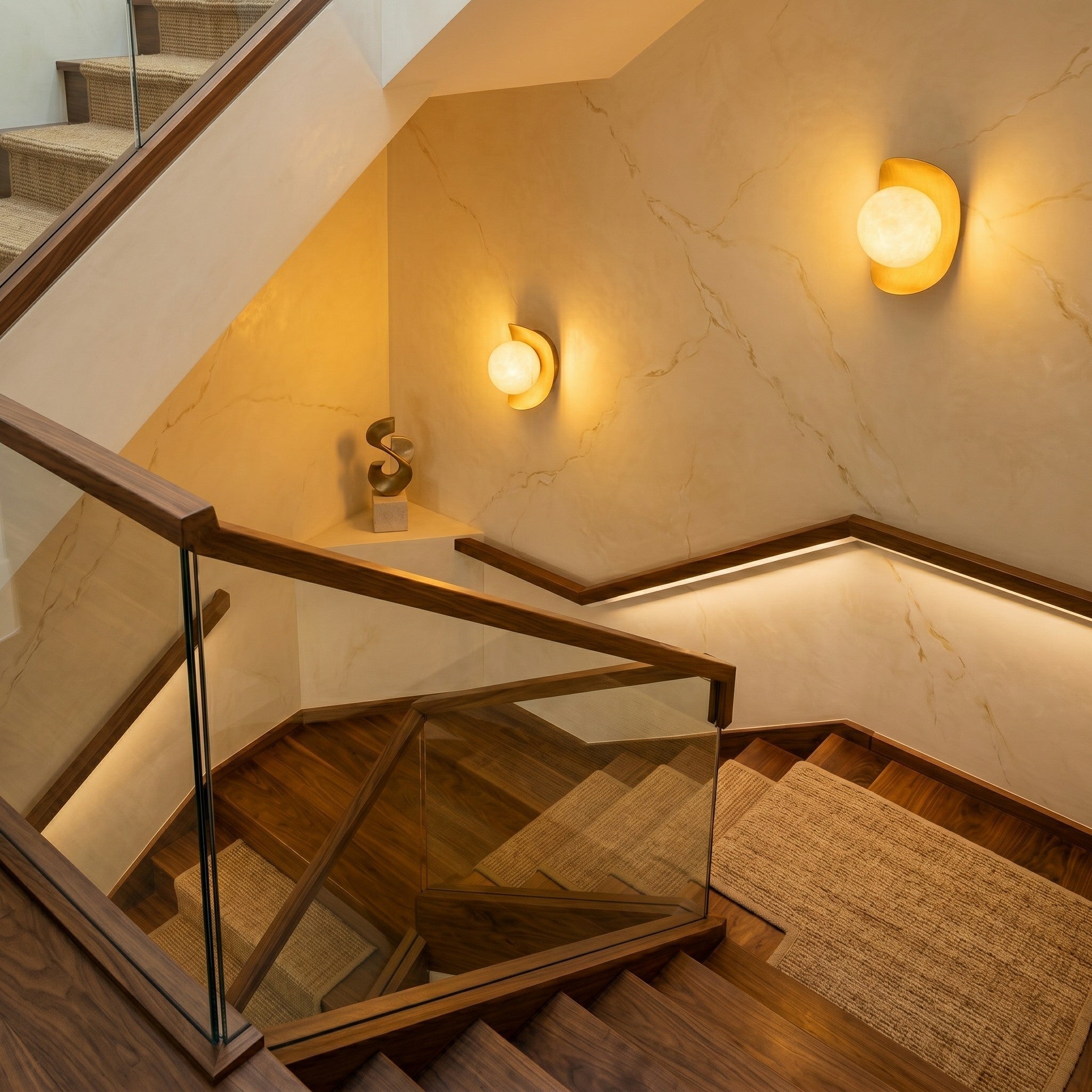 Angled view of the Nouvel Alabaster Wall Sconce, highlighting the natural veining in the stone shade.
