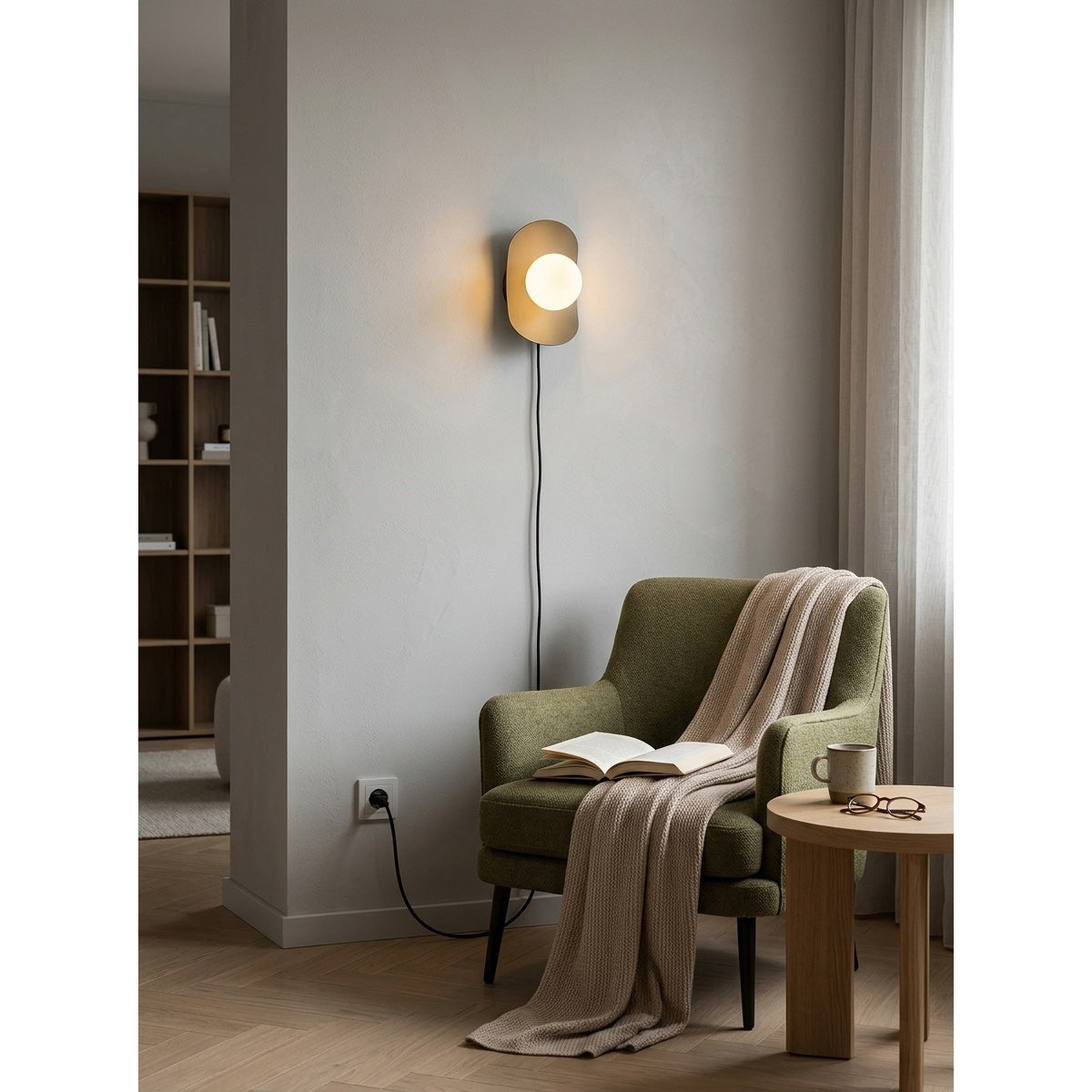 Nouvel Wall Sconce in black finish.