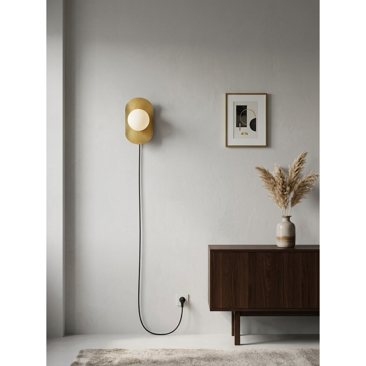 Nouvel Wall Sconce in bronze finish.