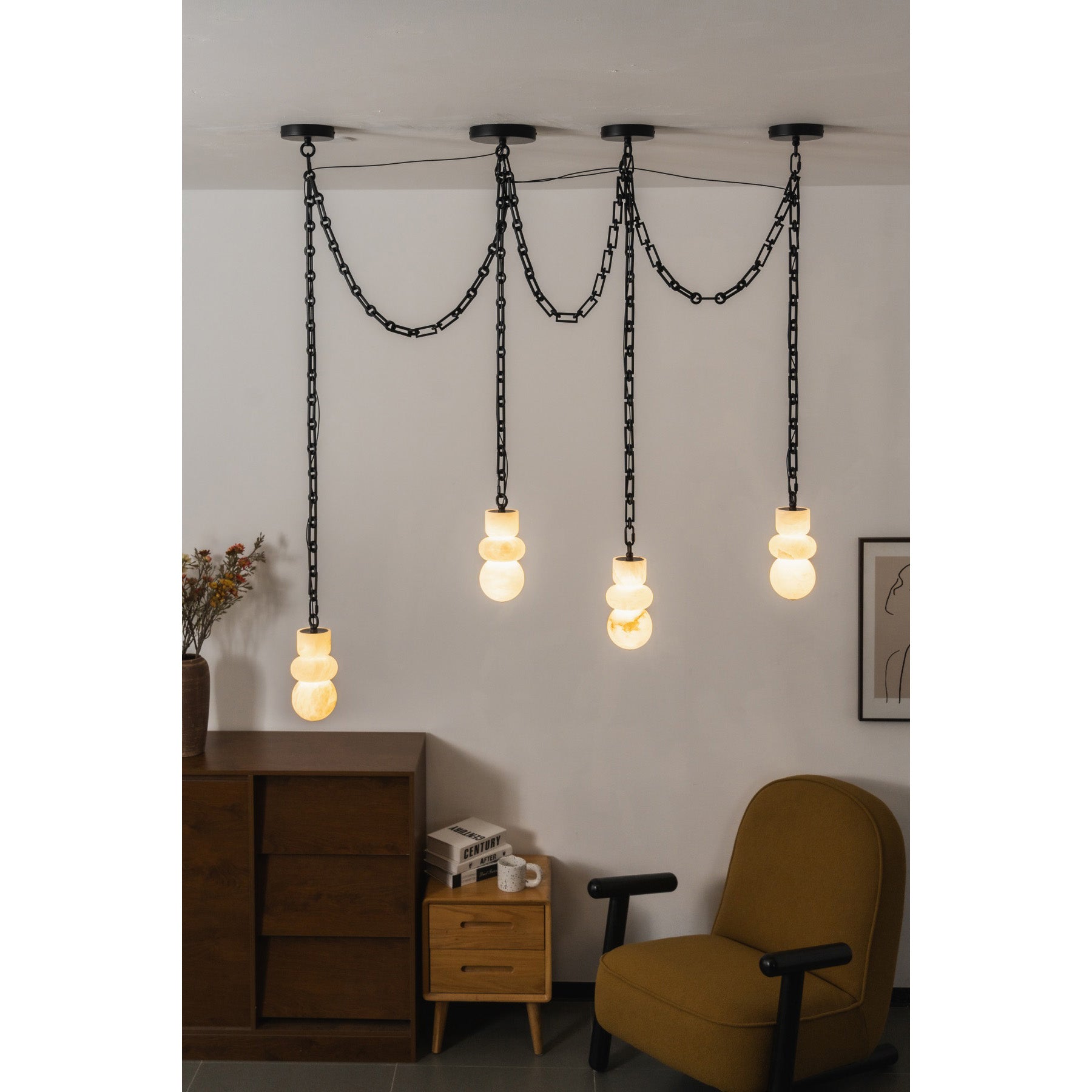 Orba chandelier providing ambient lighting in a minimalist space.