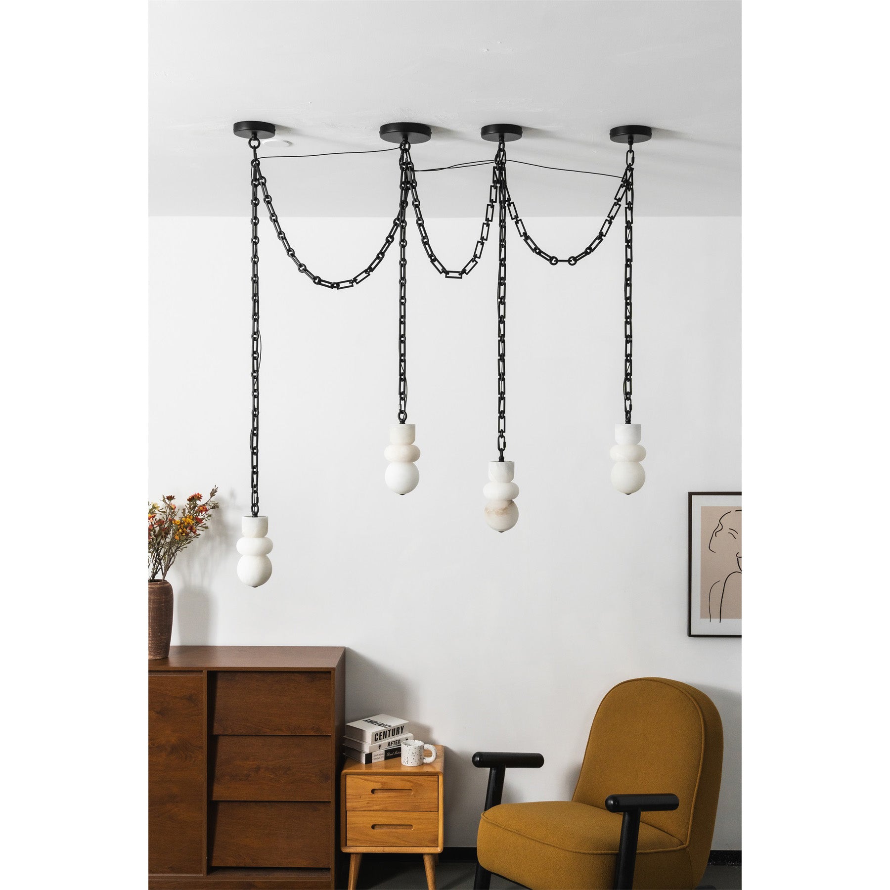 A four-head configuration of the Orba Chain Alabaster Chandelier.