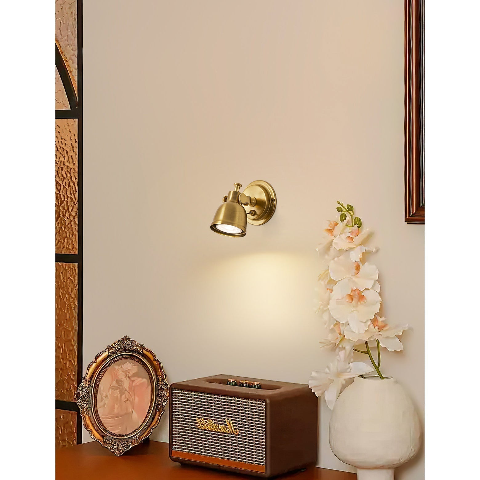 The Orwell Wall Sconce swiveled to the side.