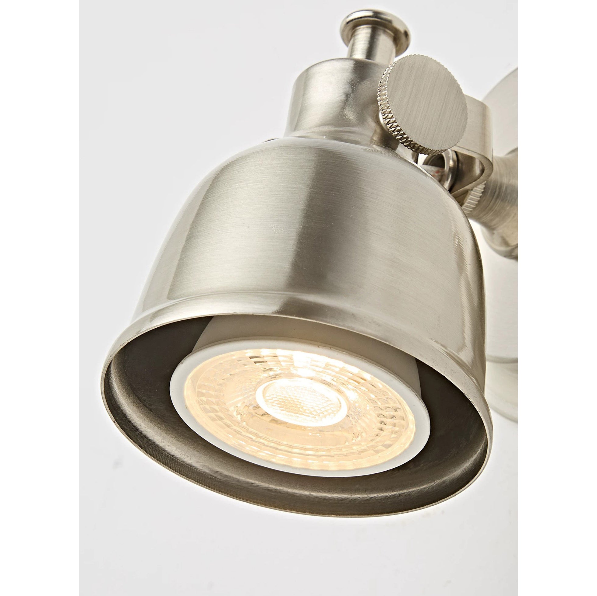 Orwell Wall Sconce used as accent lighting in a stylish cafe.