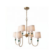 Palmer Chandelier with antique brass finish and pleated fabric shades.