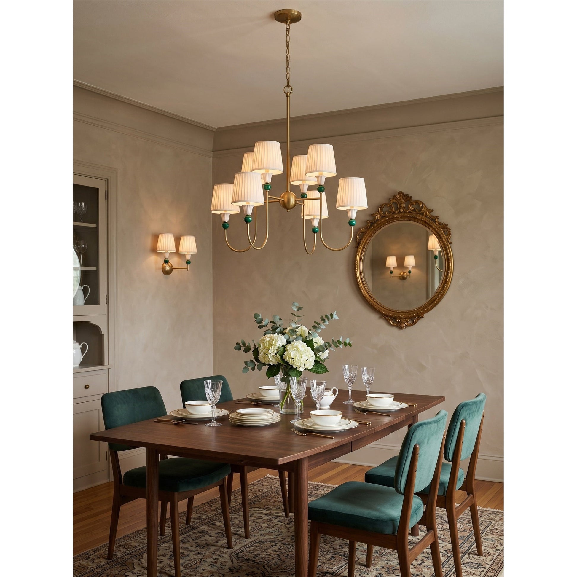A styled shot of the Palmer Chandelier in a grand entryway foyer.