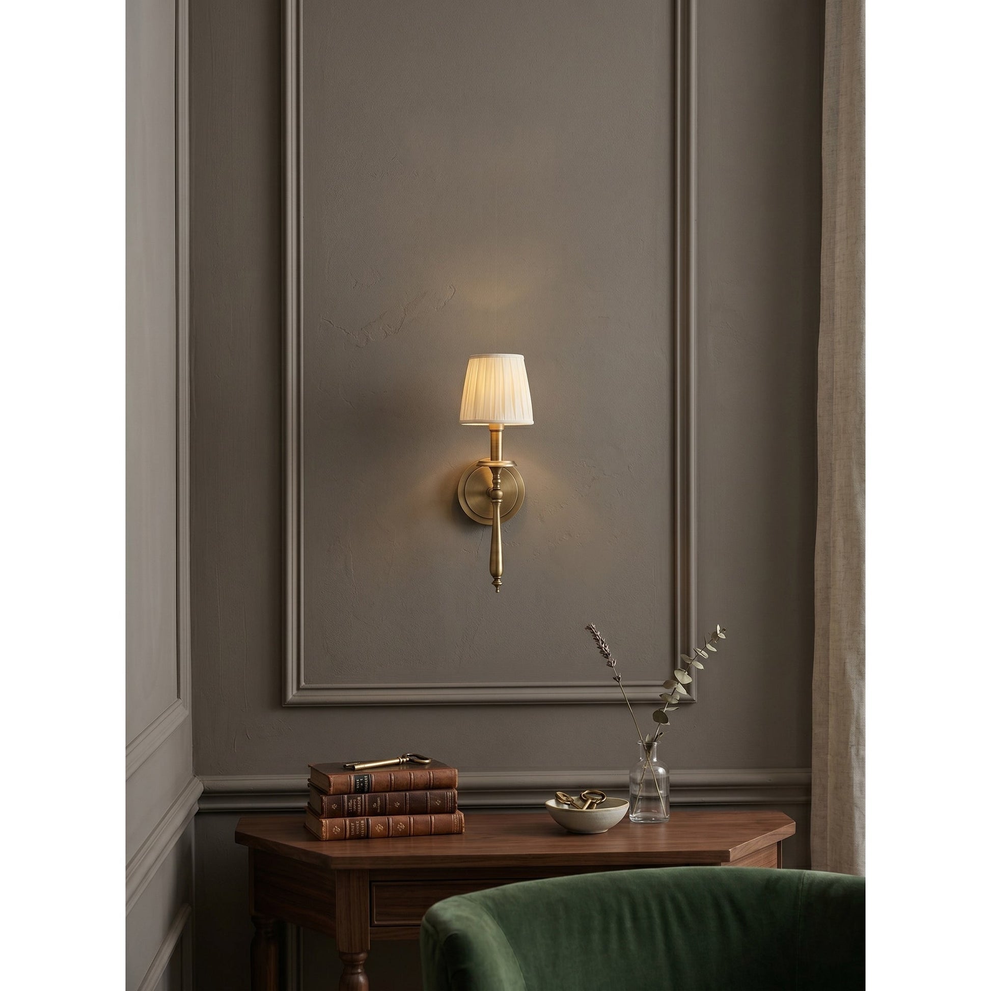 The wall sconce shown from the side profile.