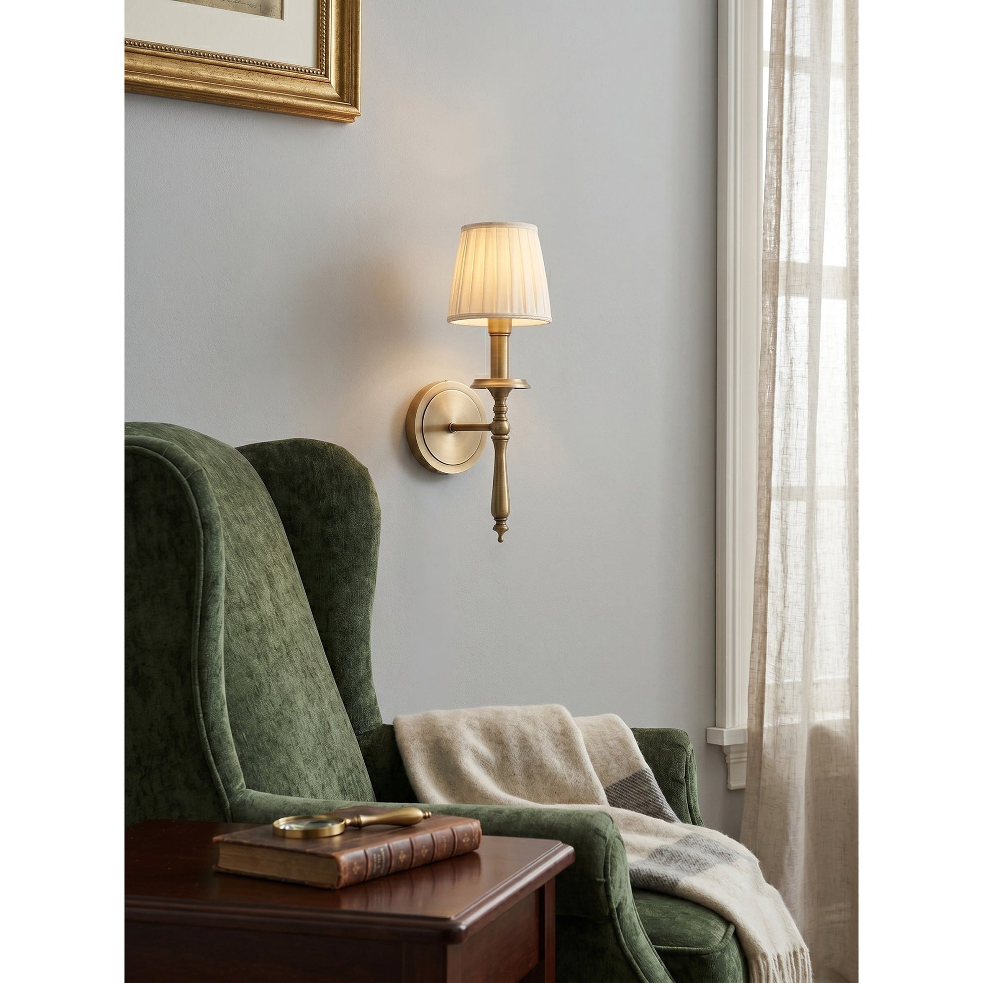 Payson Wall Sconce against a dark wall for a dramatic contrast.
