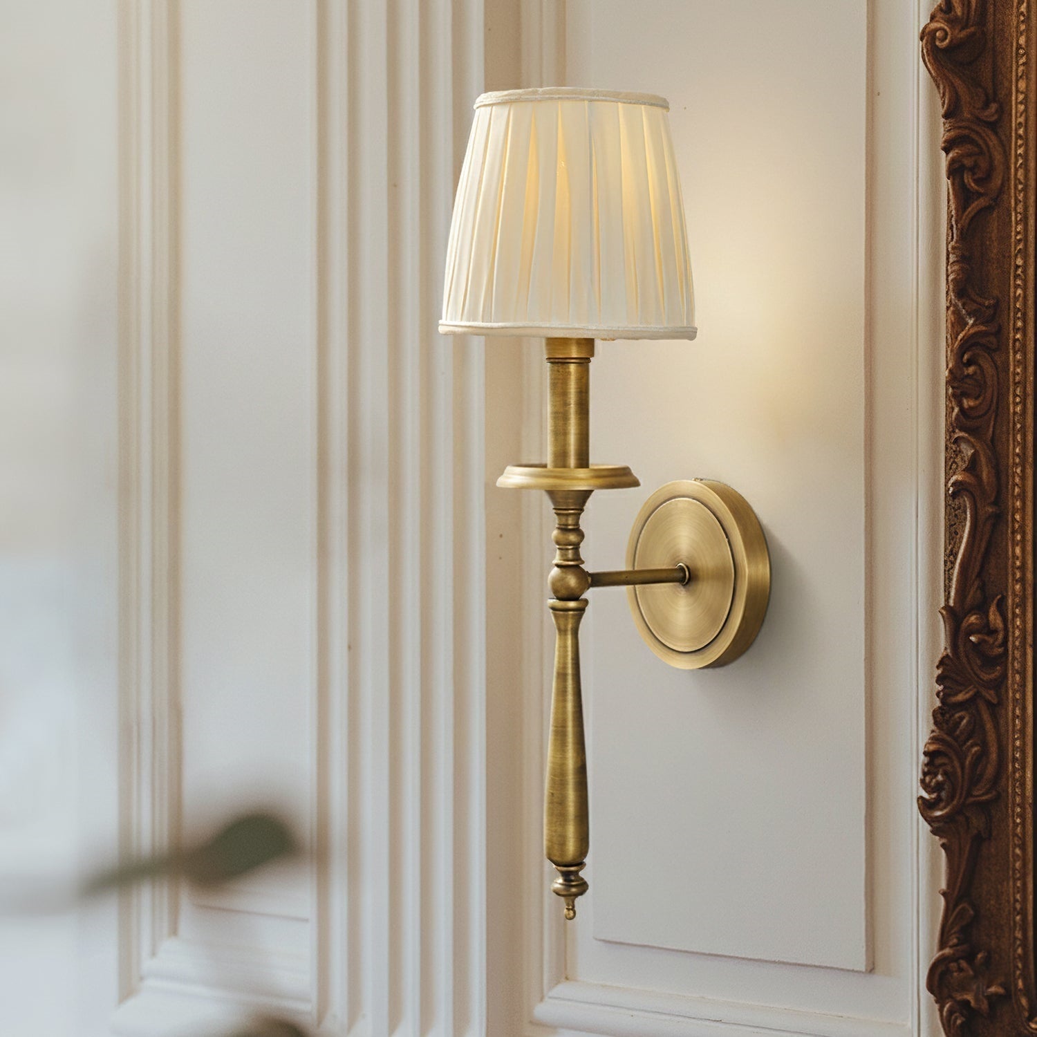 Close-up shot of the pleated beige fabric shade.