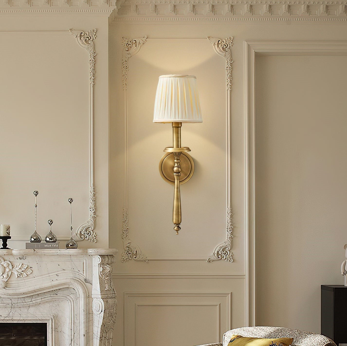 A pair of Payson Wall Sconces flanking a painting in a living room.