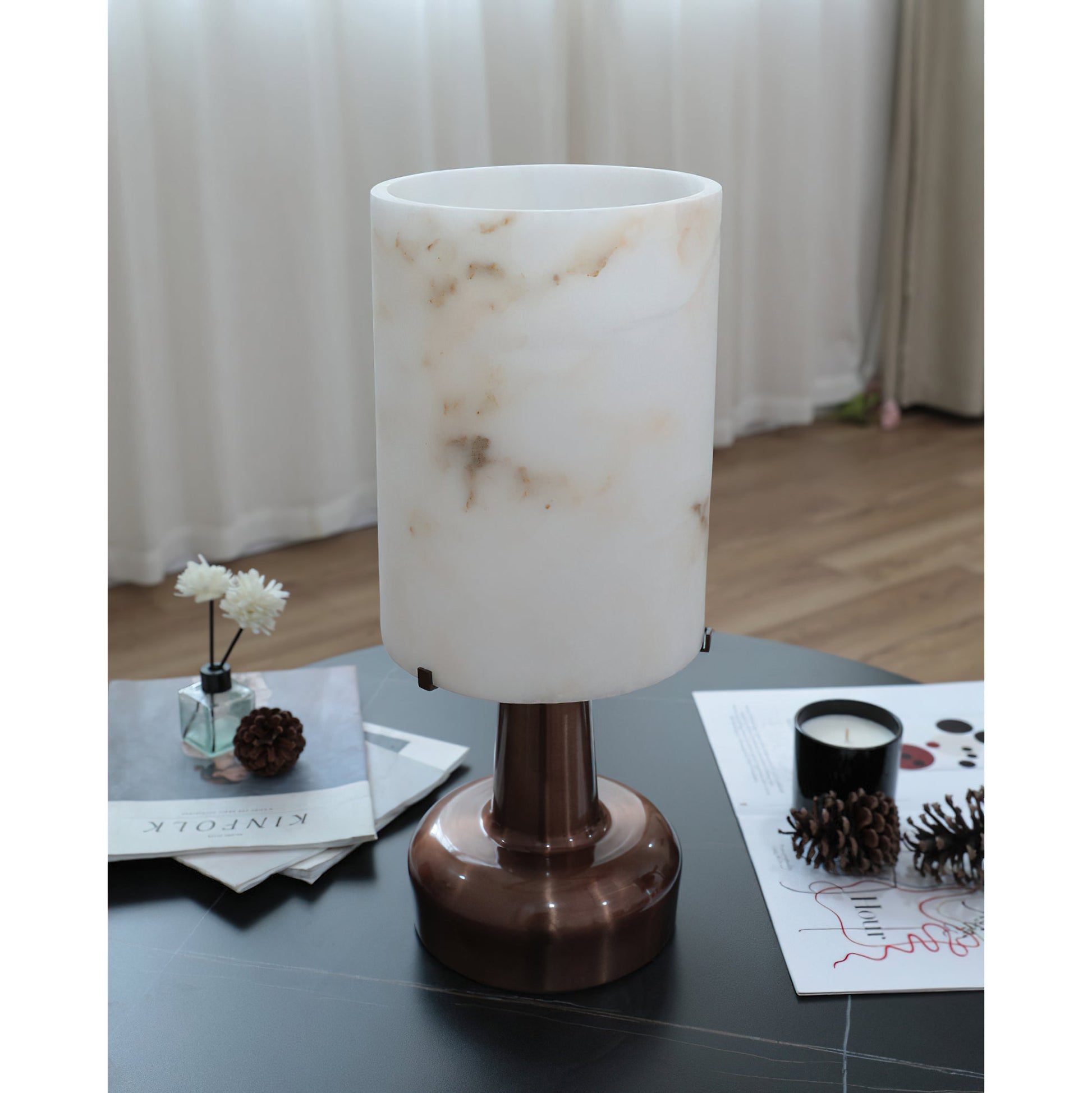 Alabaster table lamp used for elevated shelf styling.