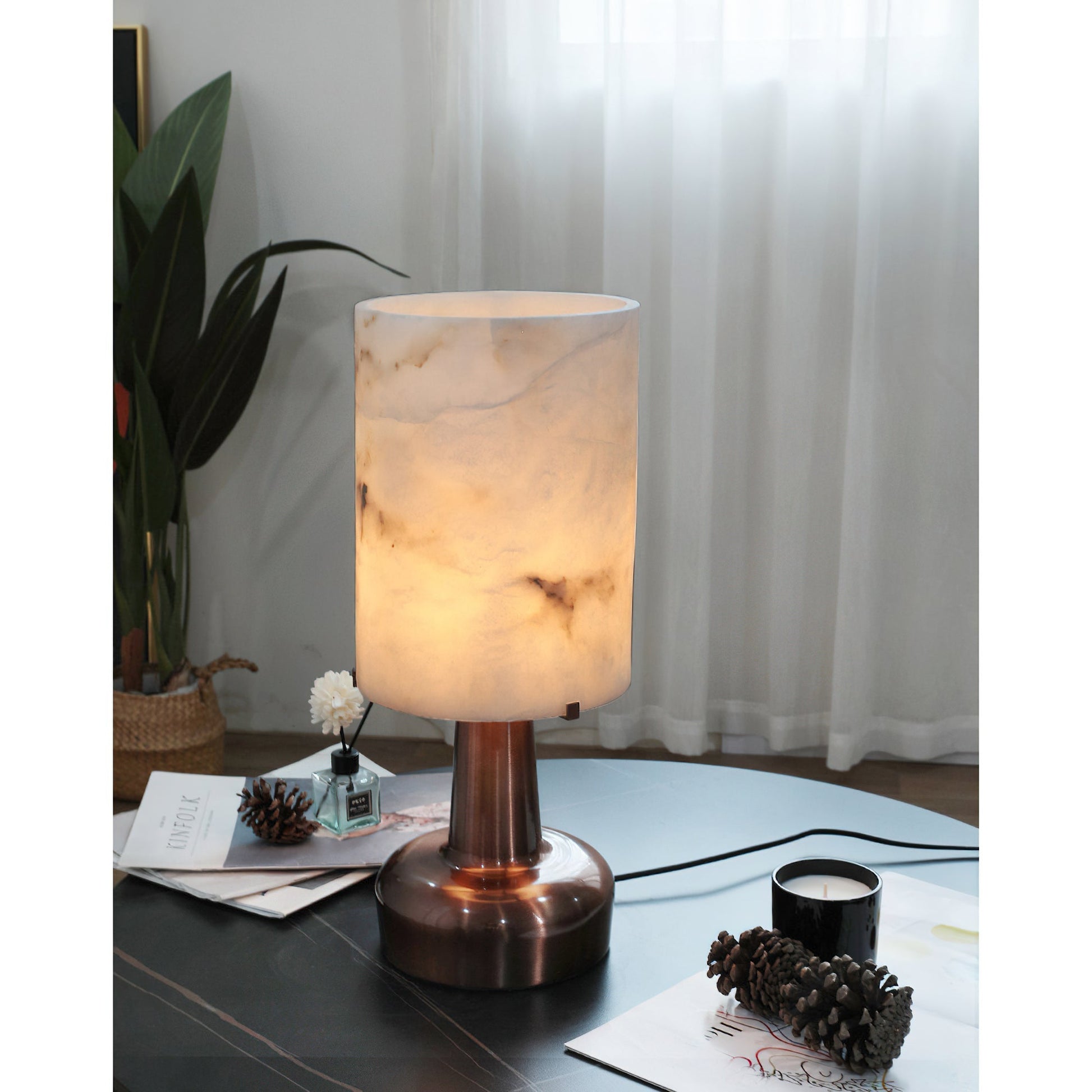 The lamp in a dimly lit room, creating a moody ambiance.