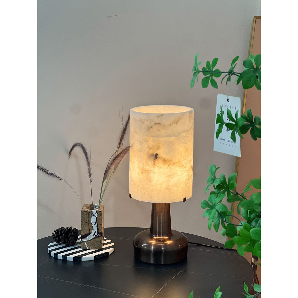 Lifestyle image of the alabaster lamp in a sophisticated home interior.
