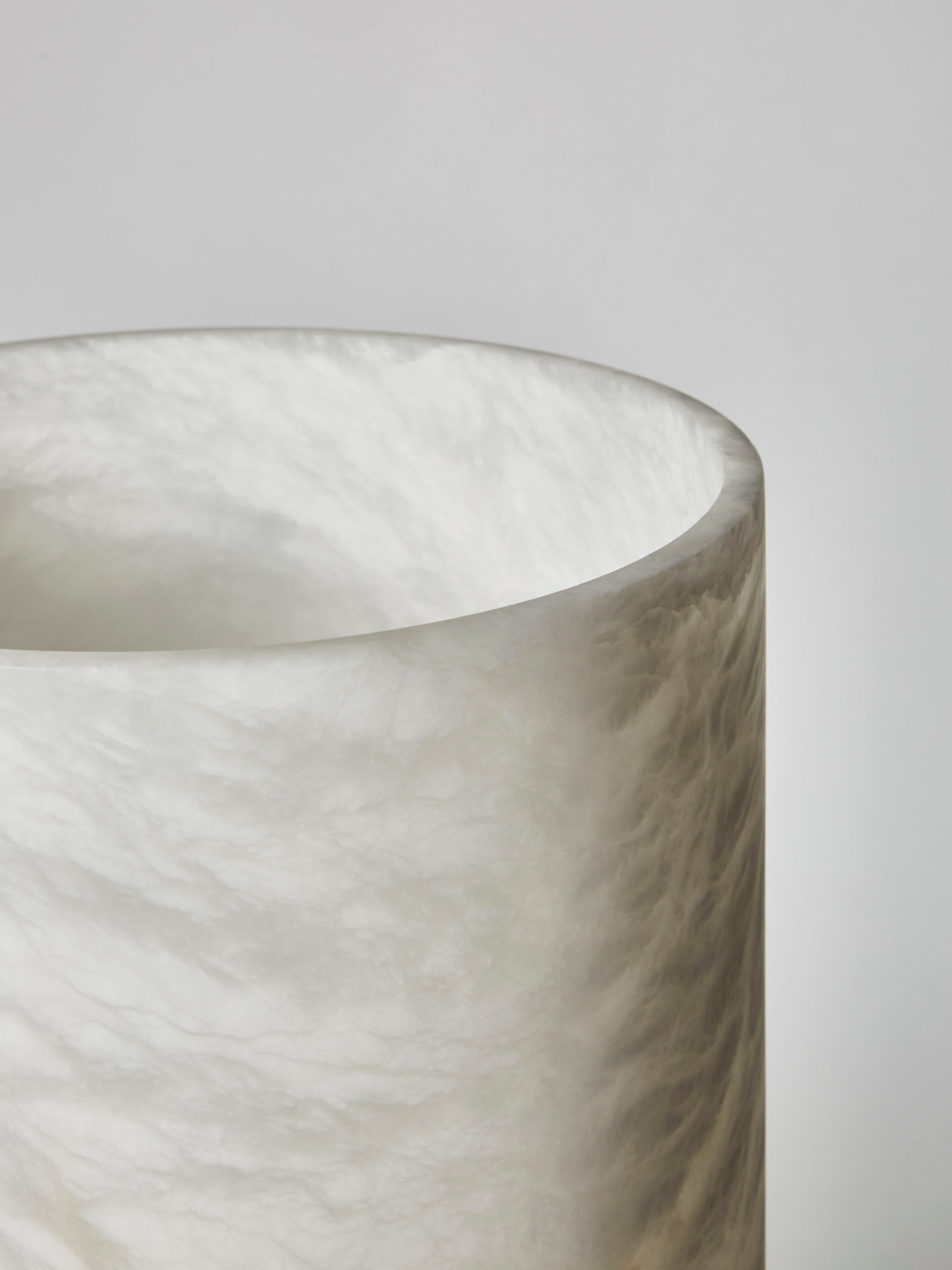 The table lamp shown with its plug cord.