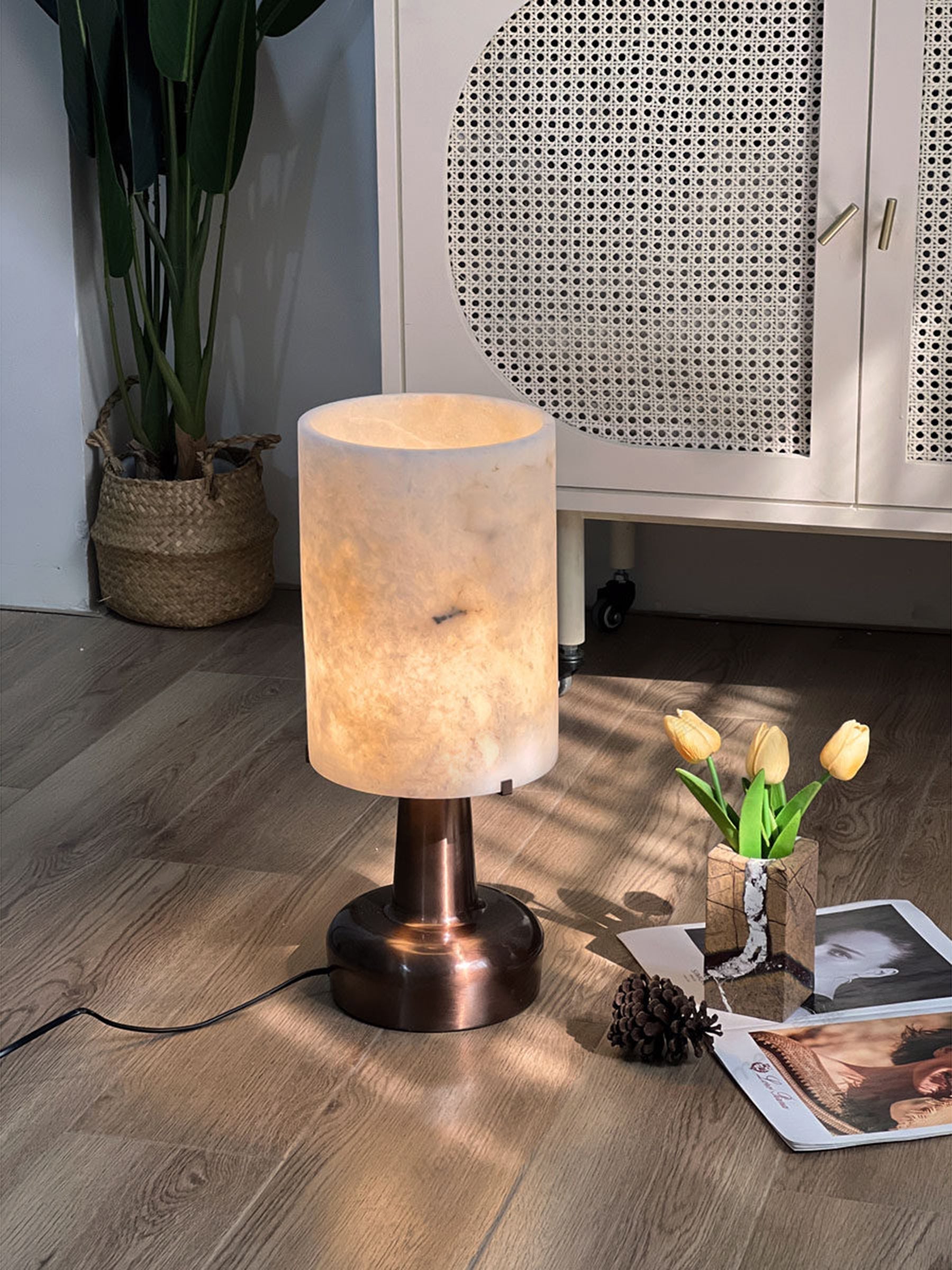 Front view of the pear-shaped alabaster table lamp, highlighting its form.