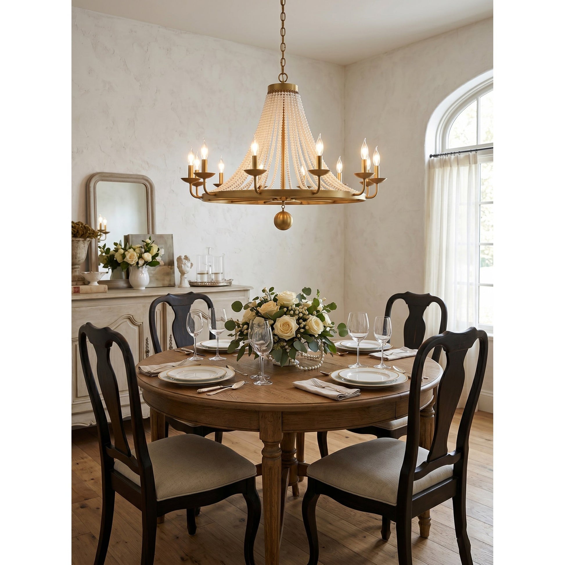 The chandelier shown unlit against a plain background to highlight its form.
