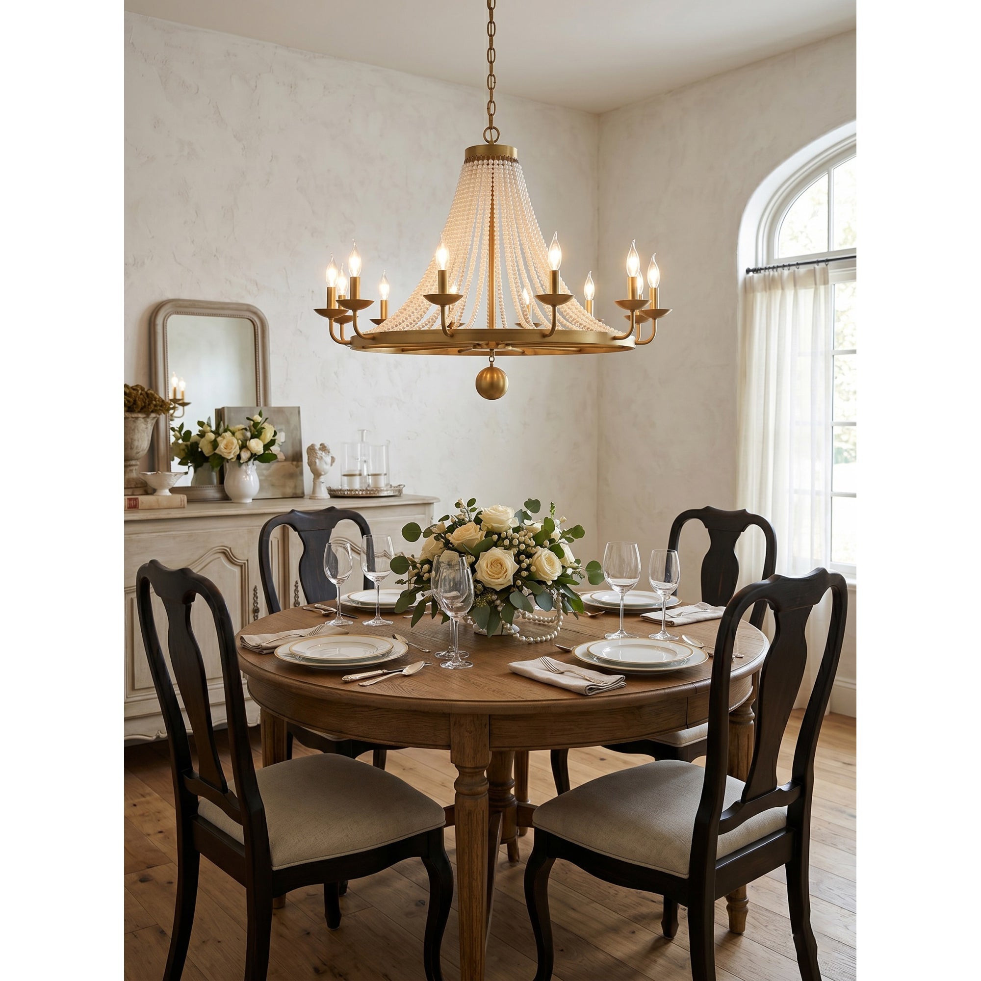 The chandelier shown unlit against a plain background to highlight its form.