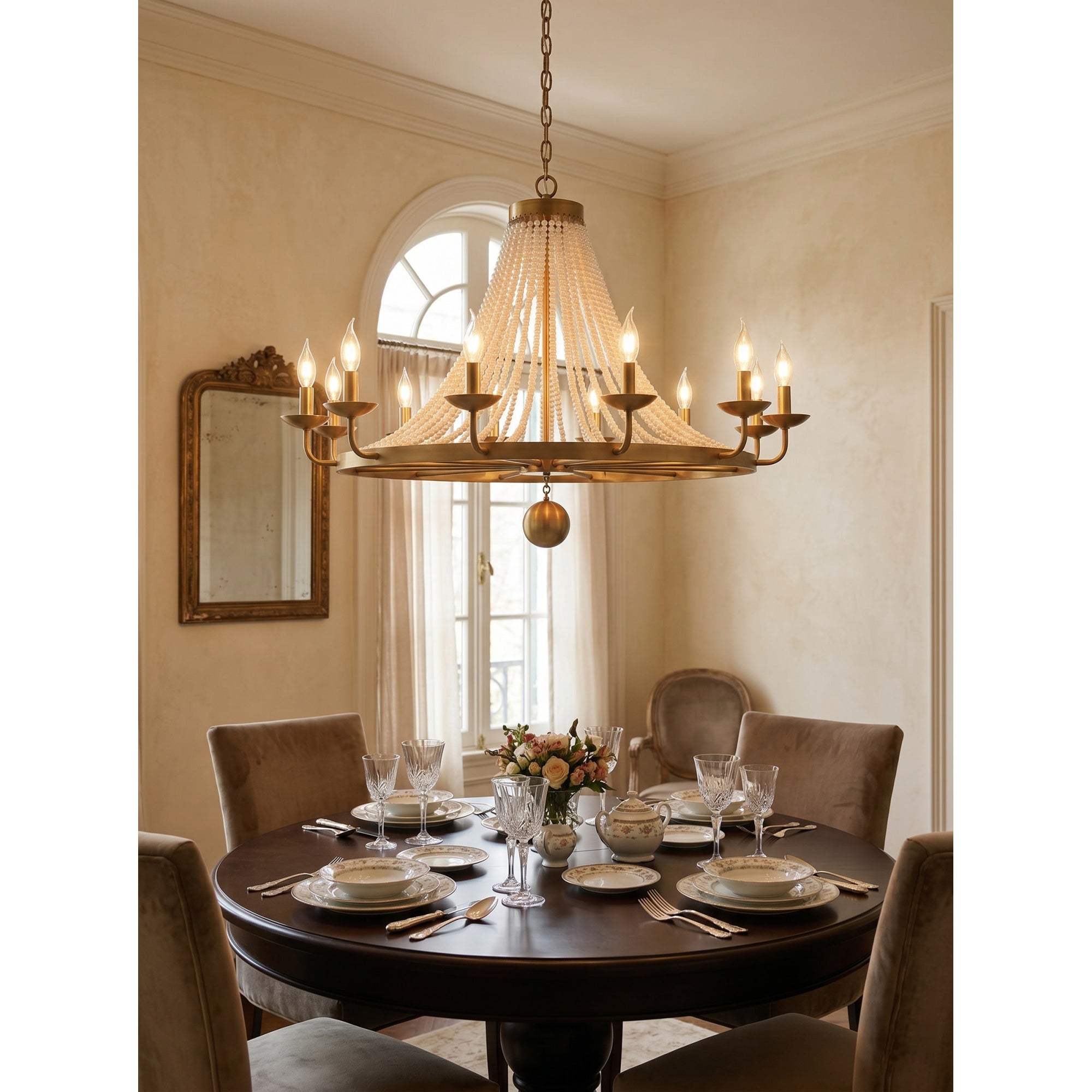 The chandelier in a luxury master bedroom, adding a romantic touch.