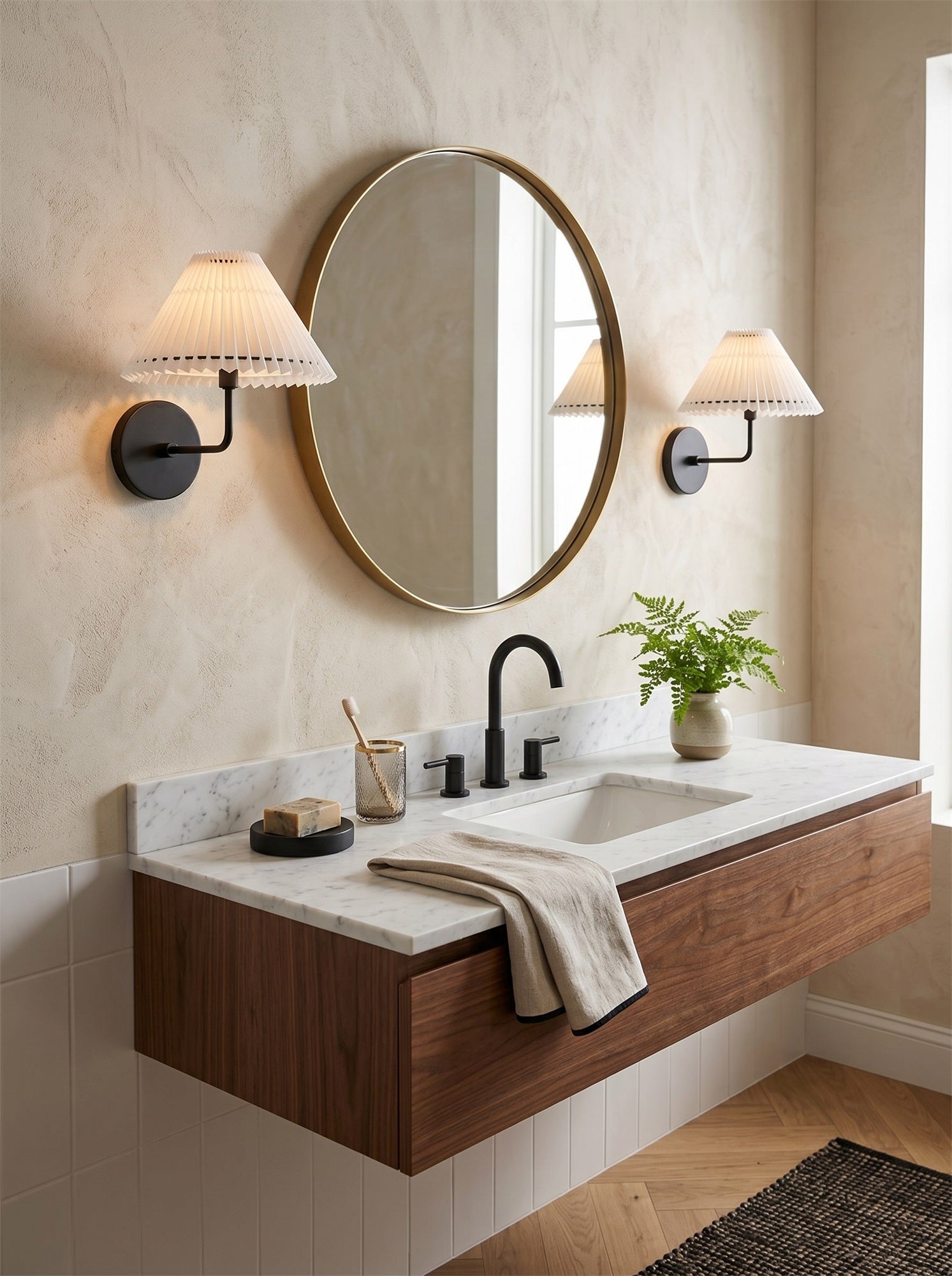 Angled view of the Pearson Wall Sconce highlighting its fluted shade.