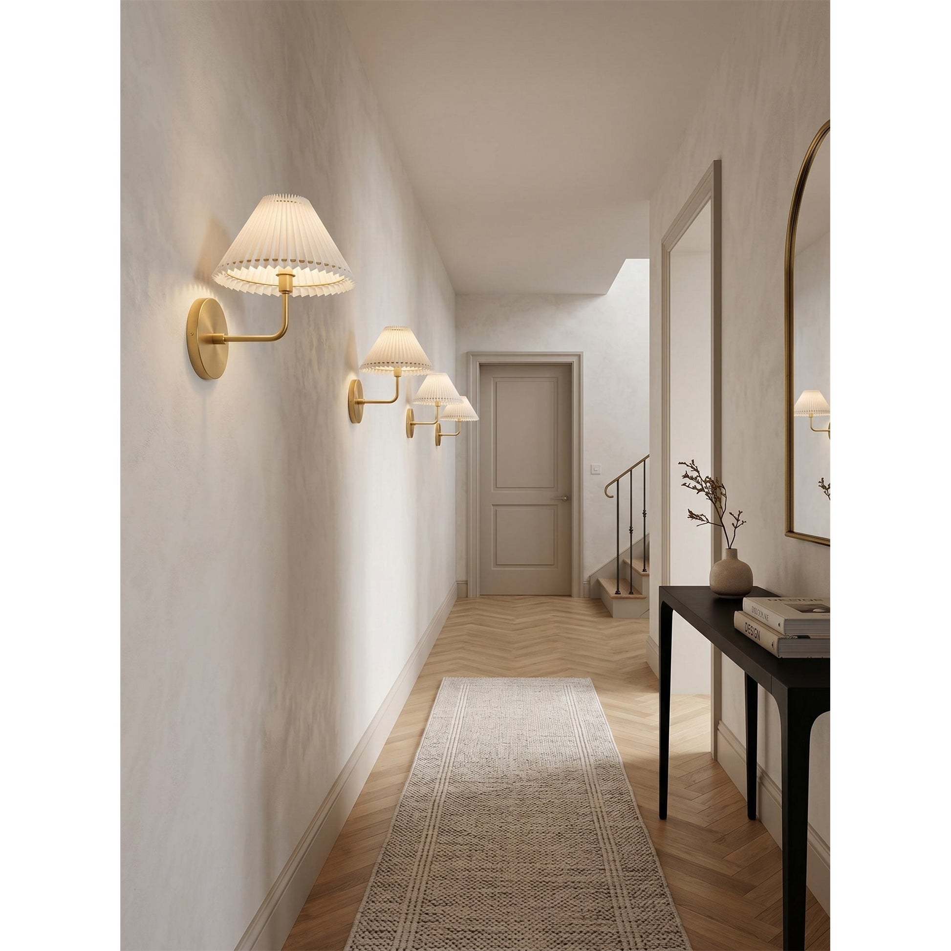 Pearson Wall Sconce used as a vanity light in a modern bathroom.