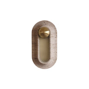 Front view of the Pfaffikon Travertine Wall Sconce, showing its oval shape and central brass dome.