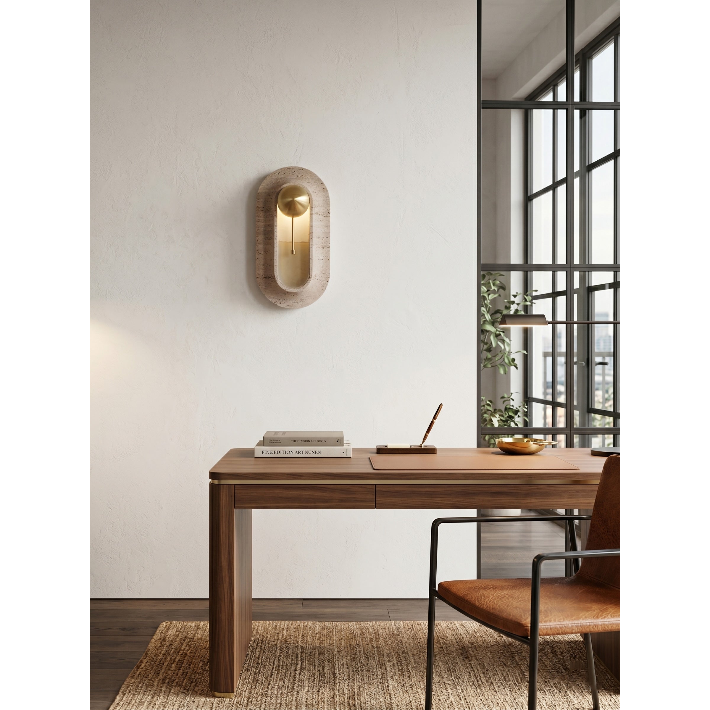 Lifestyle view of the travertine sconce in a minimalist entryway above a console table.