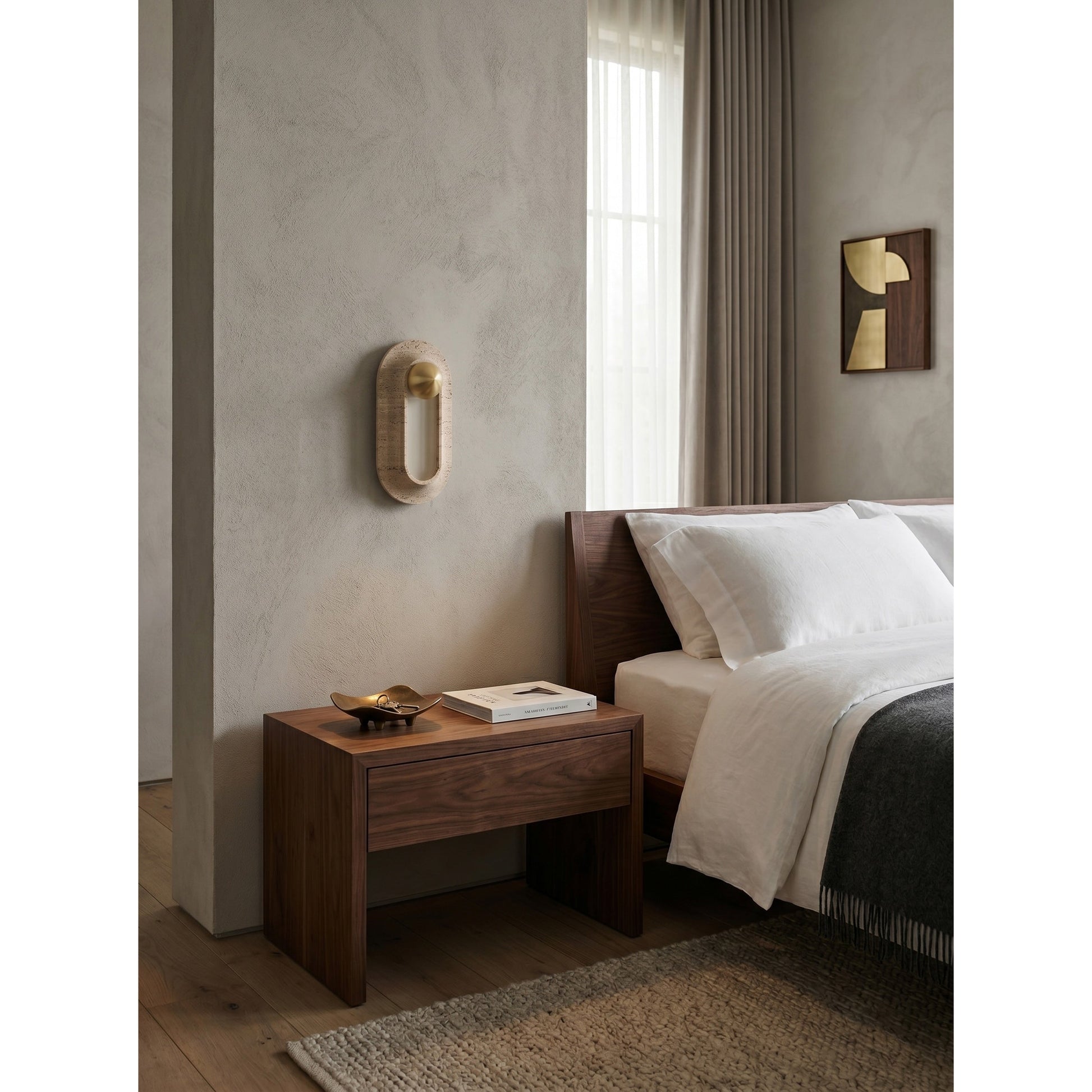 Side profile of the wall sconce, showing its depth and how it mounts to the wall.