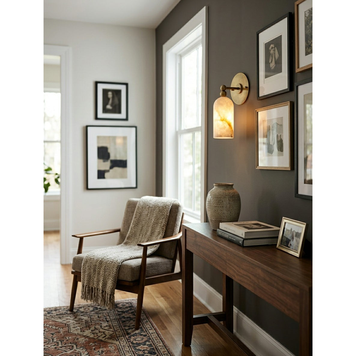Lifestyle photo of the sconce in a Japandi-style living space.
