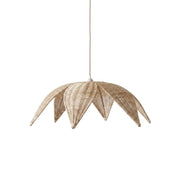Rattan Leaves Pendant Lamp hanging in a bright dining room.