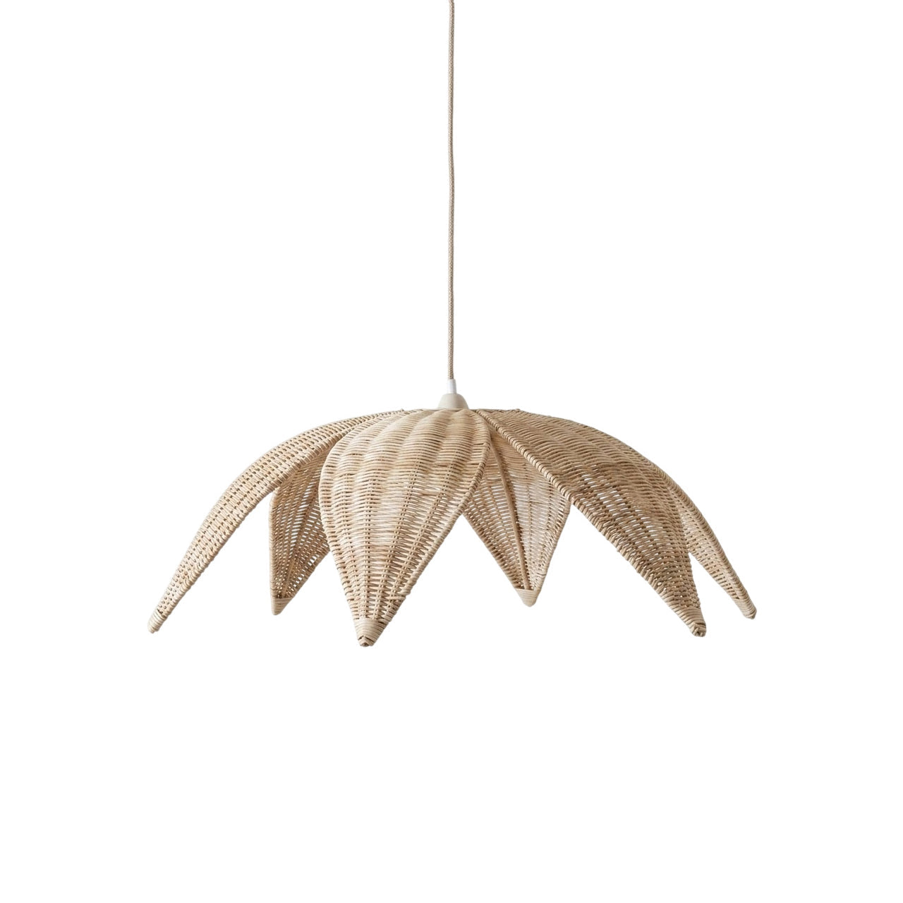 Rattan Leaves Pendant Lamp hanging in a bright dining room.