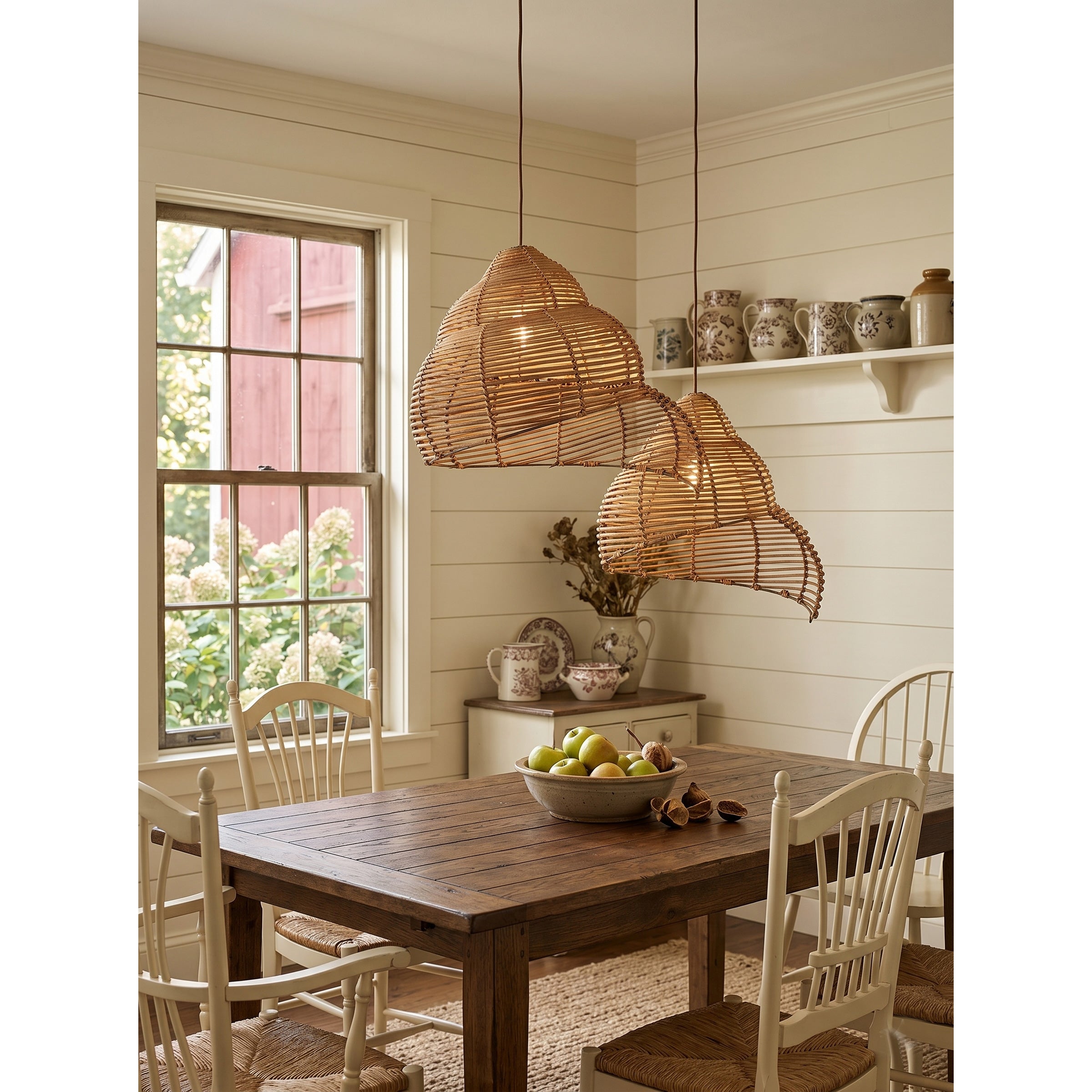A view of the lamp hanging over a kitchen island.