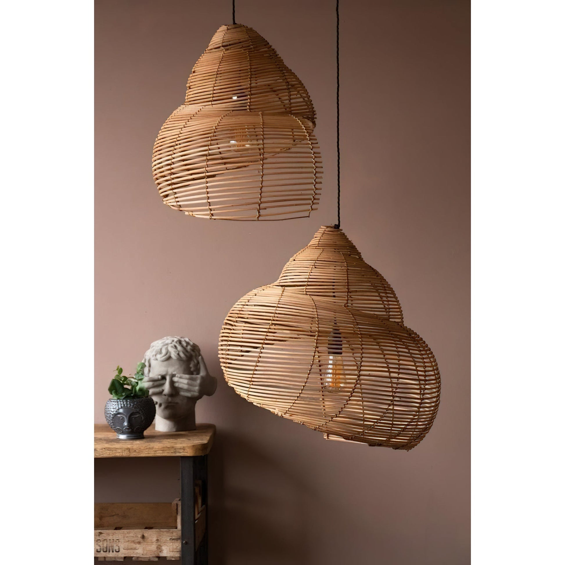 Top-down view of the intricate weaving of the rattan pendant.