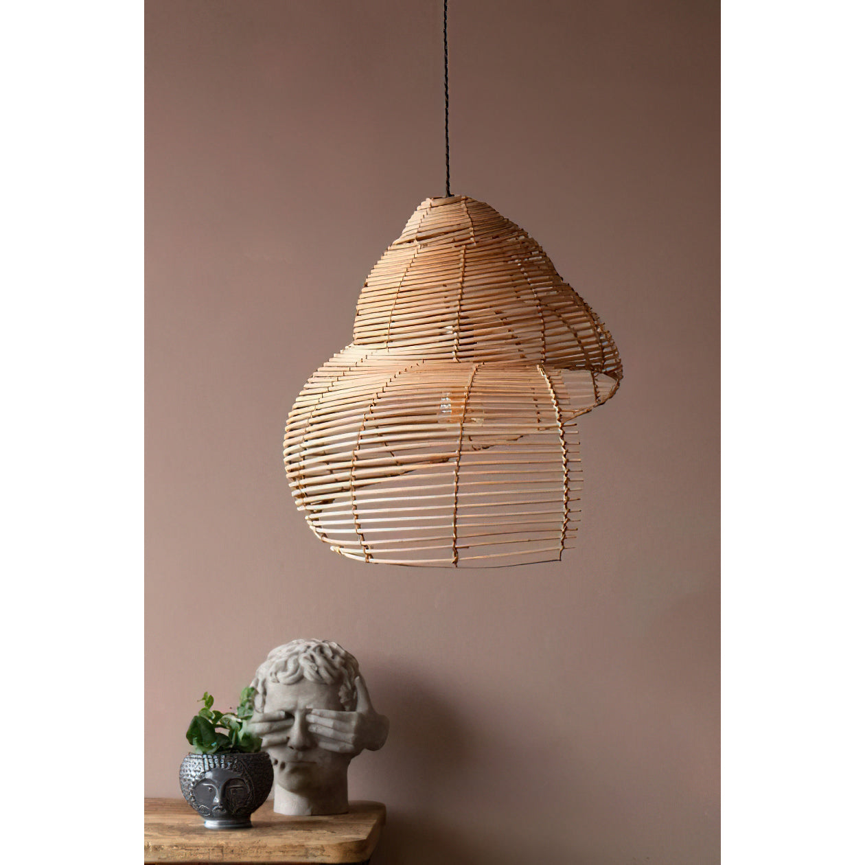 The lamp's natural texture complementing wooden furniture.
