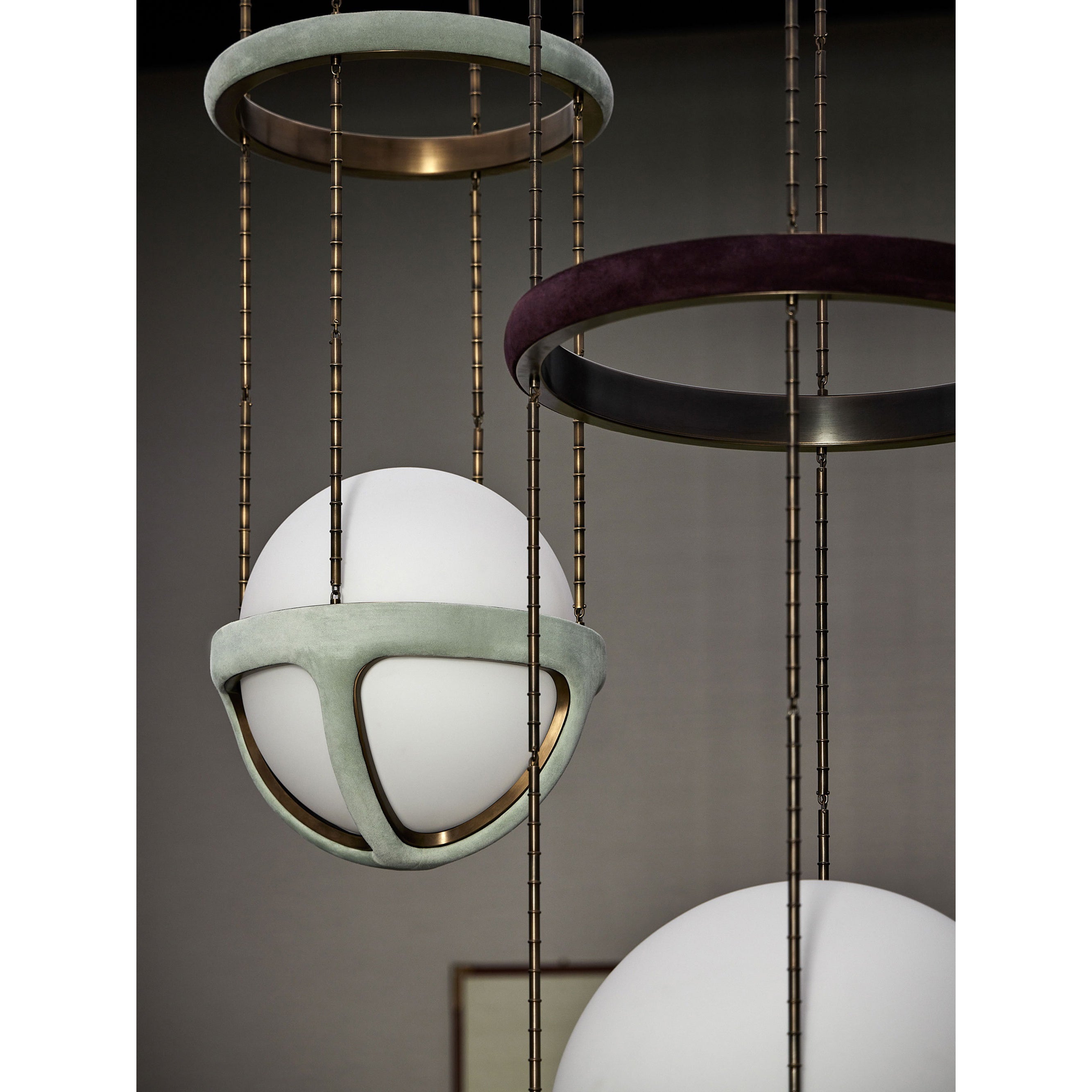 The intersection of the leather, steel, and glass components.