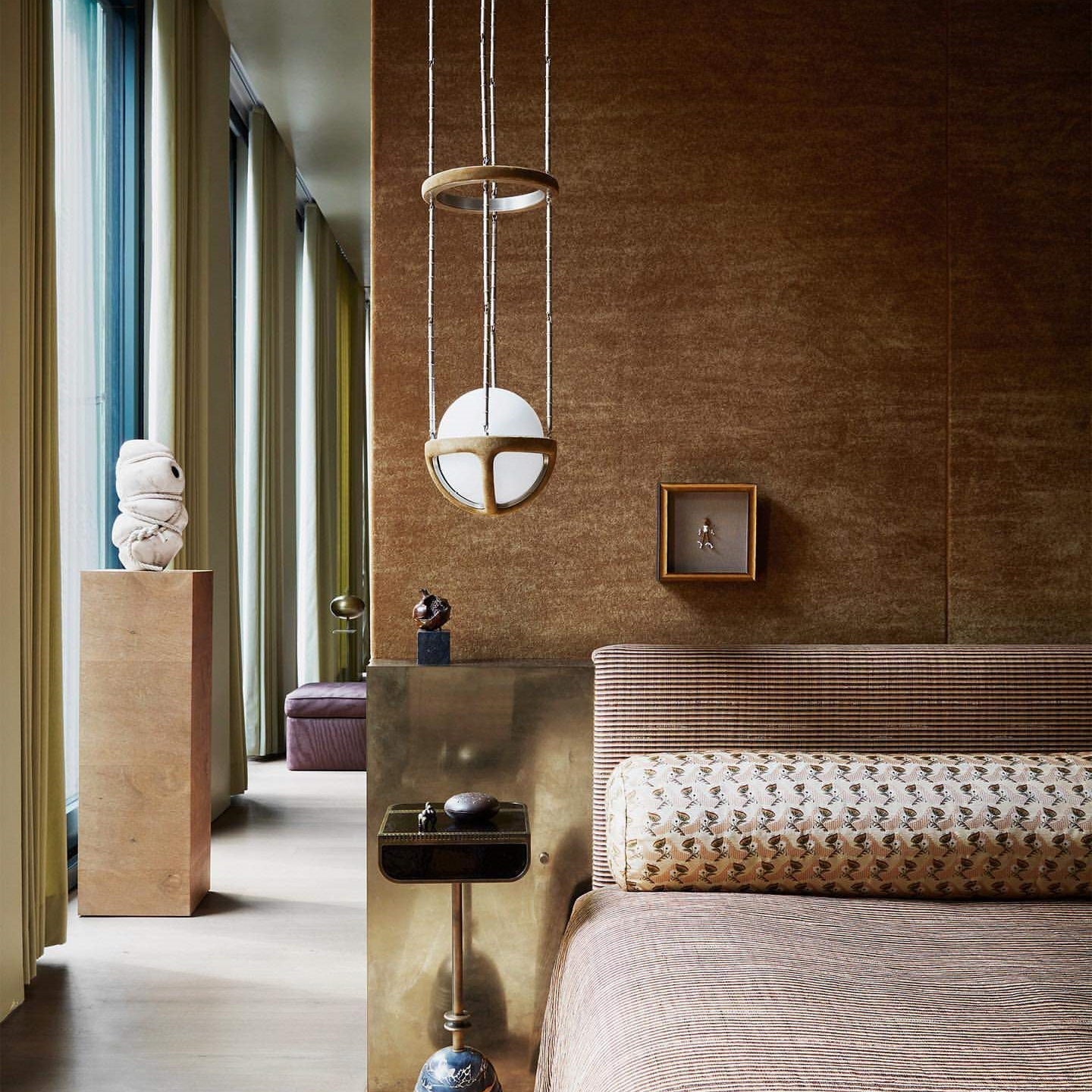 Close-up view of the stitched brown leather detail on the Reprise Pendant Lamp.