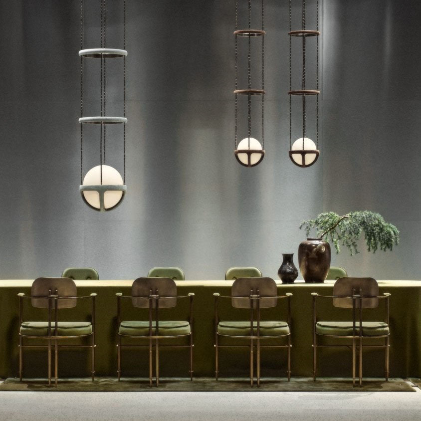Lifestyle image of the pendant lamp in a sophisticated home office.