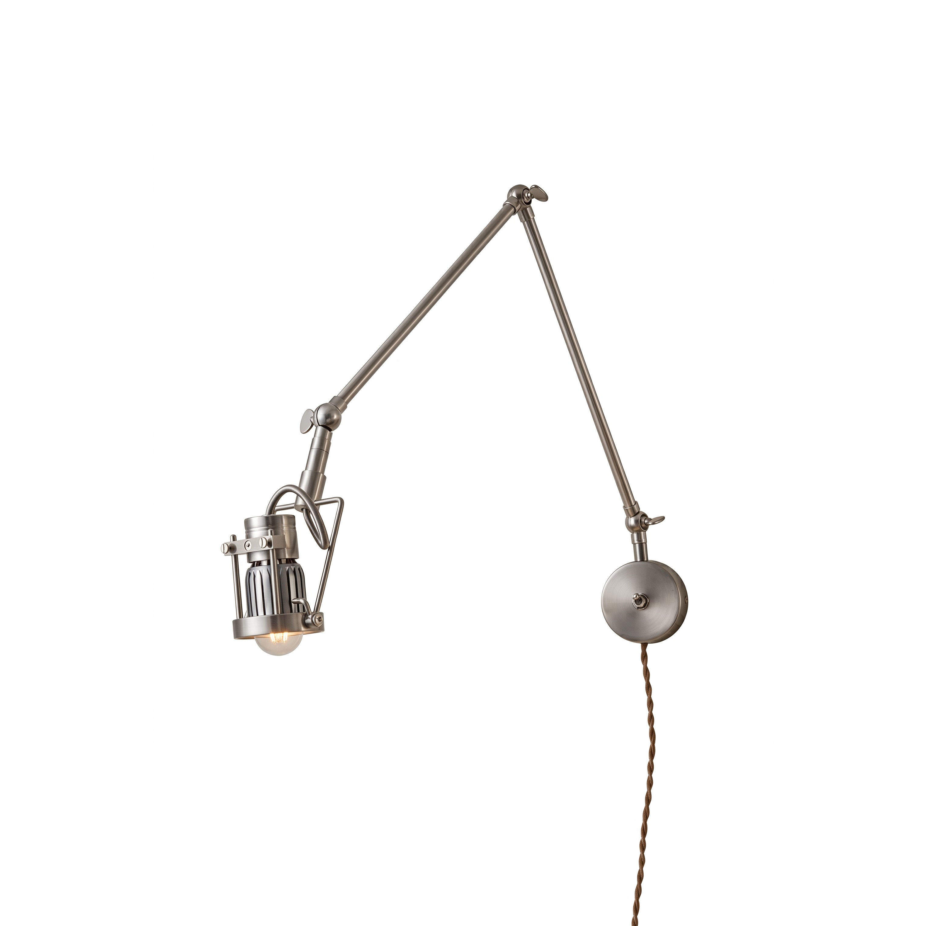 Reznor plug-in wall sconce in nickel finish, shown against a neutral wall.