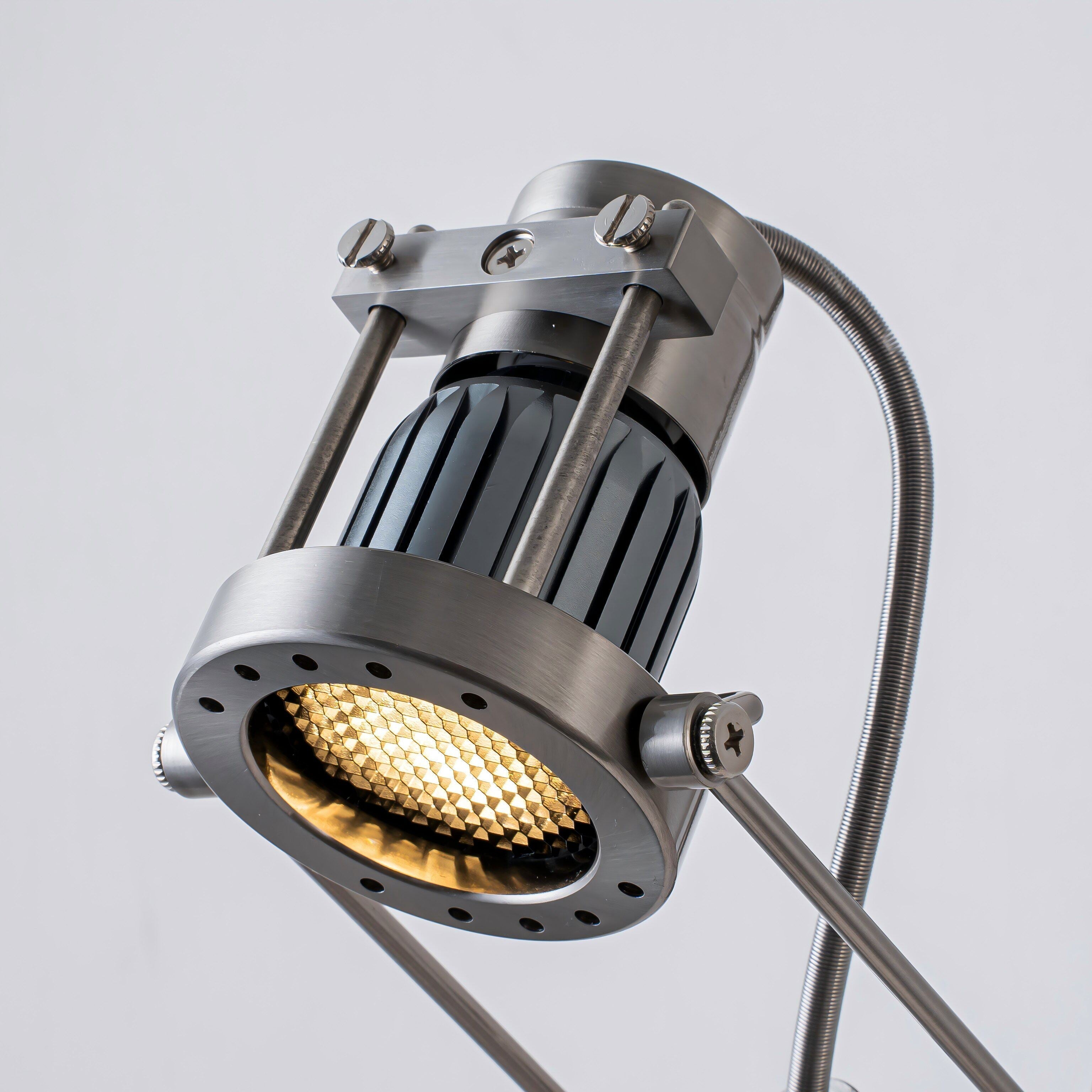 A product dimensions overlay on an image of the sconce.