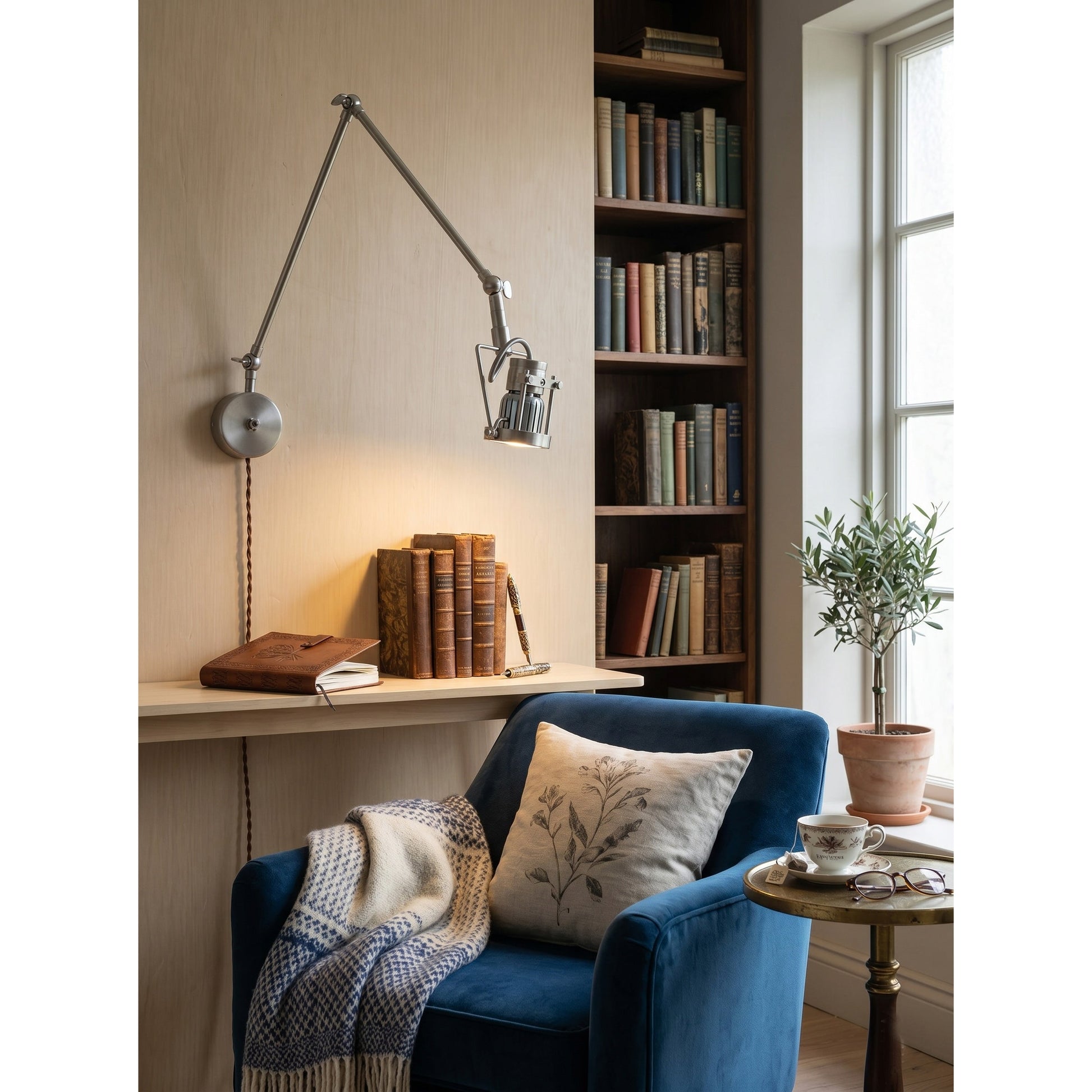 The wall sconce shown with the light turned on, casting a warm glow.