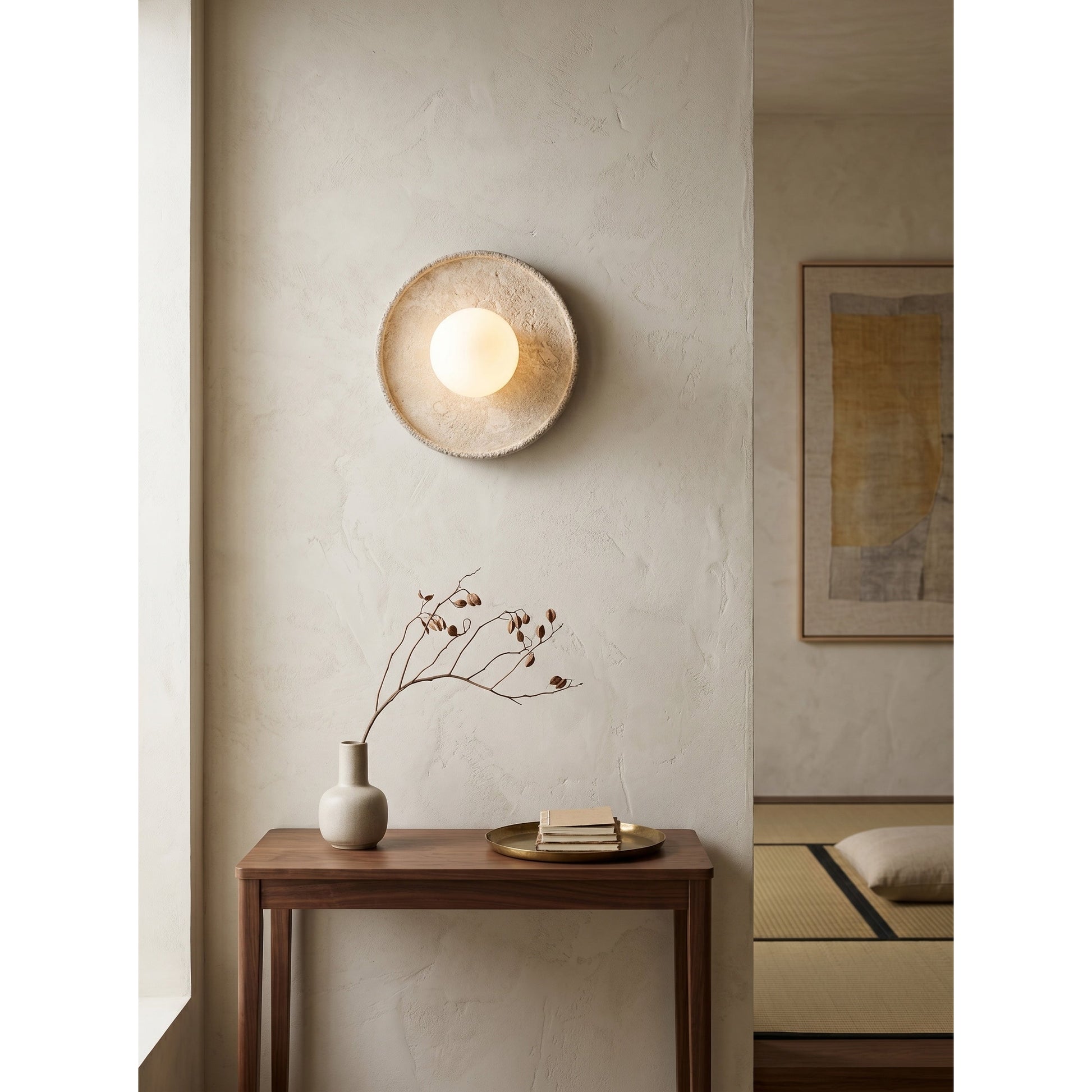 View of the sconce from below, showing the light source.