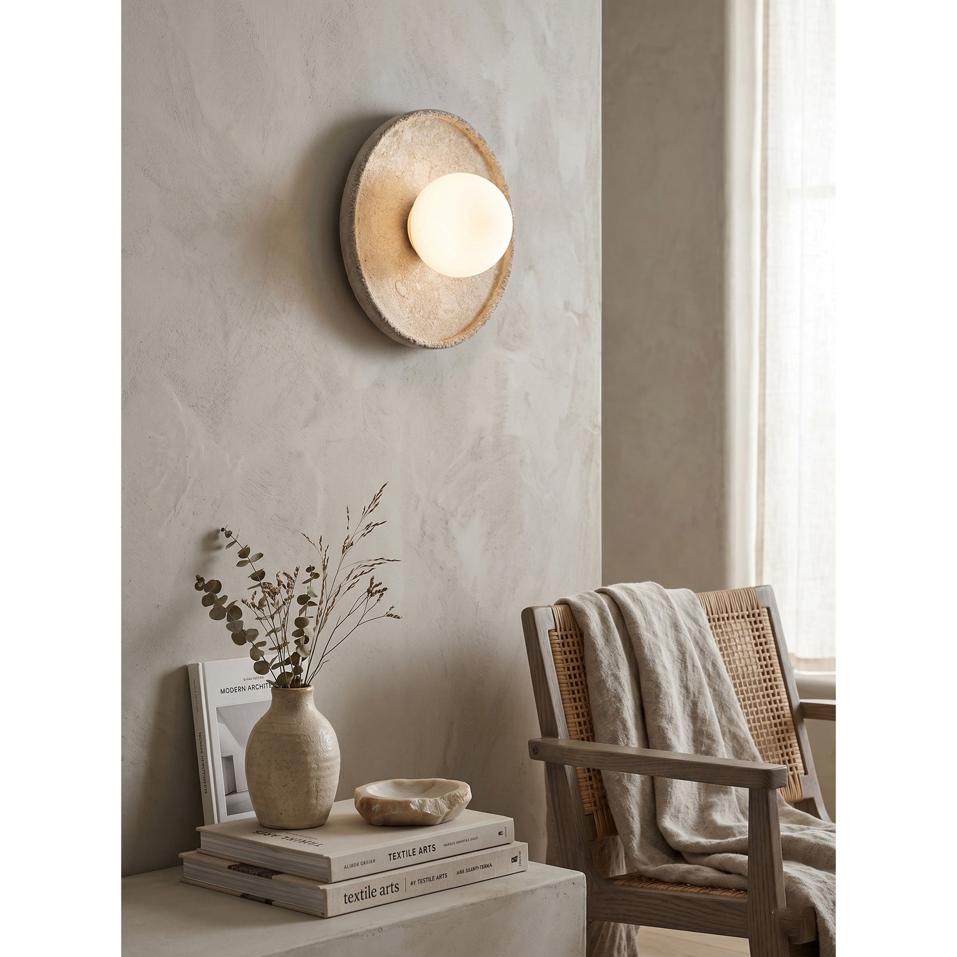 Riley Wall Sconce styled in a minimalist entryway.