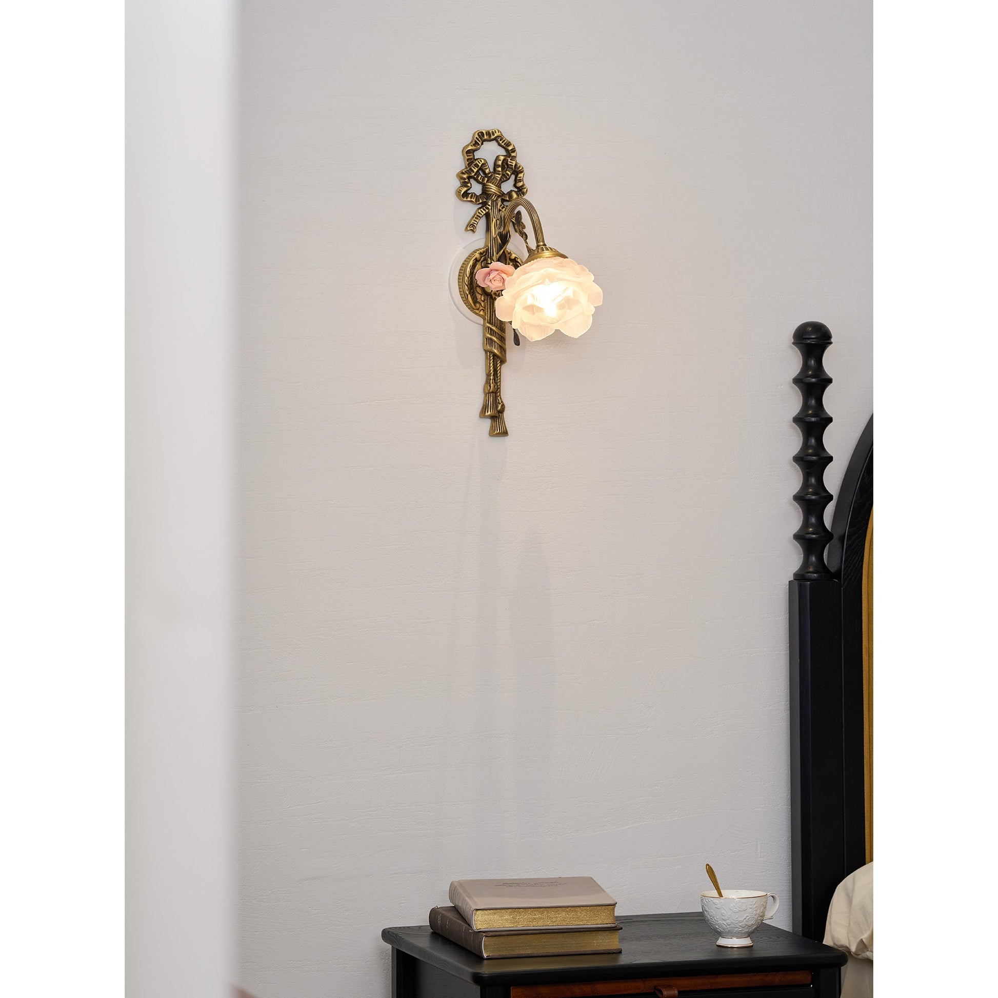 Rosalie Floral Wall Lamp, highlighting the pink flower.