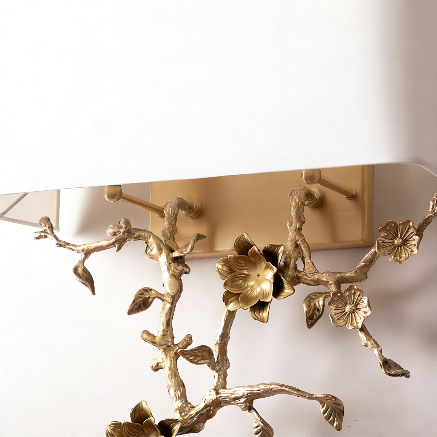 Close-up on the intricate brass flower adornments.