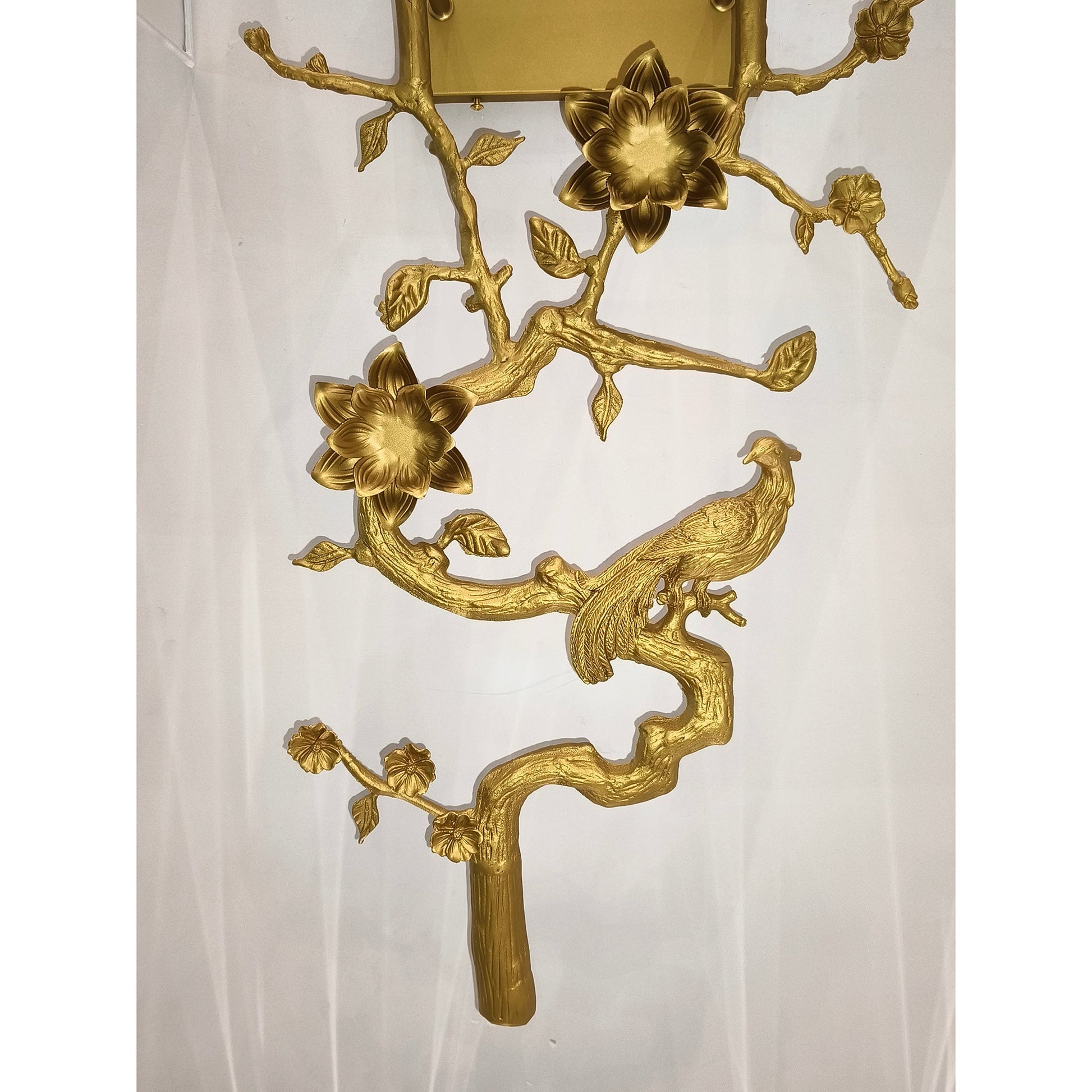 Lifestyle shot of the sconce in a curated dining room.