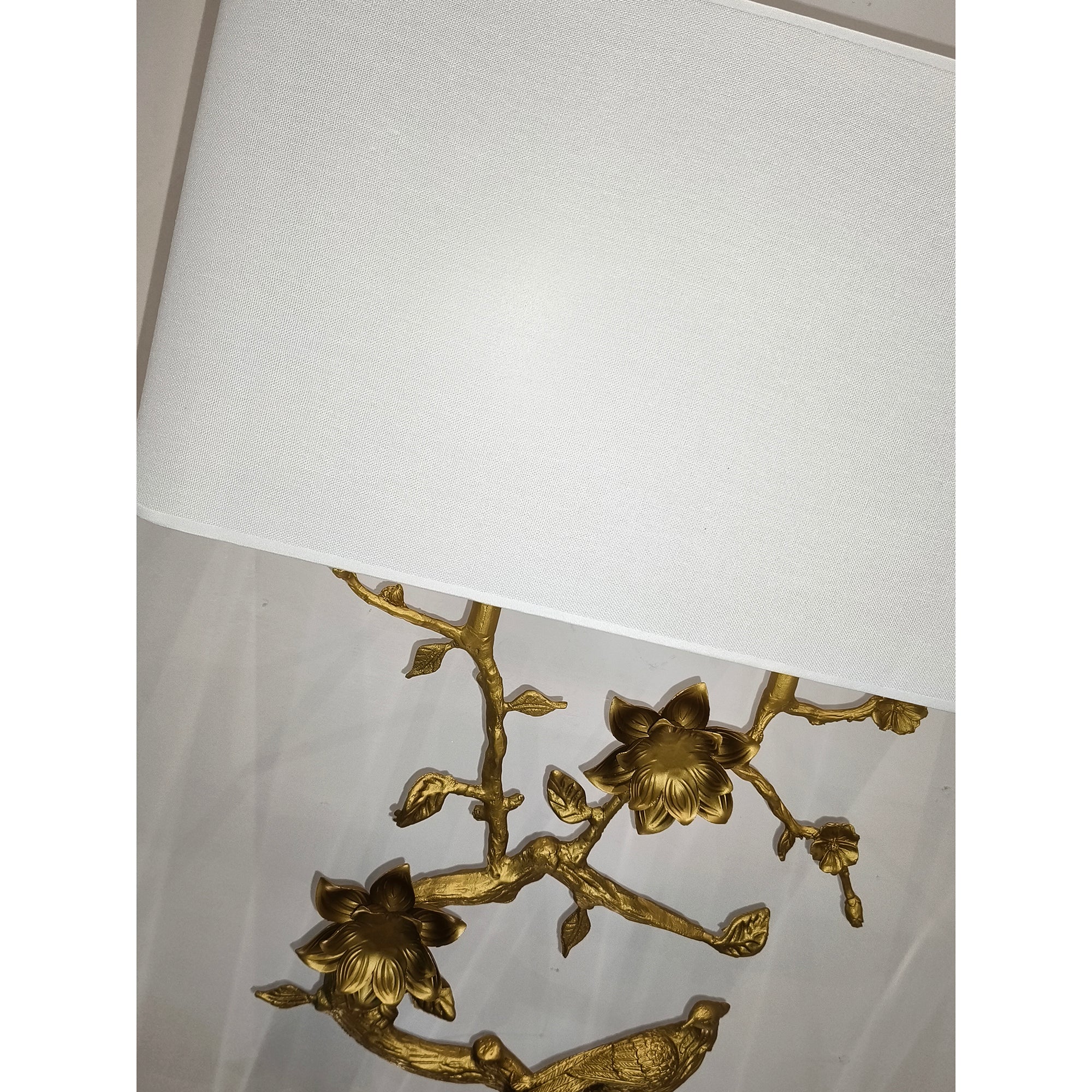 Backplate and hardwiring components of the Sanremo Wall Sconce.