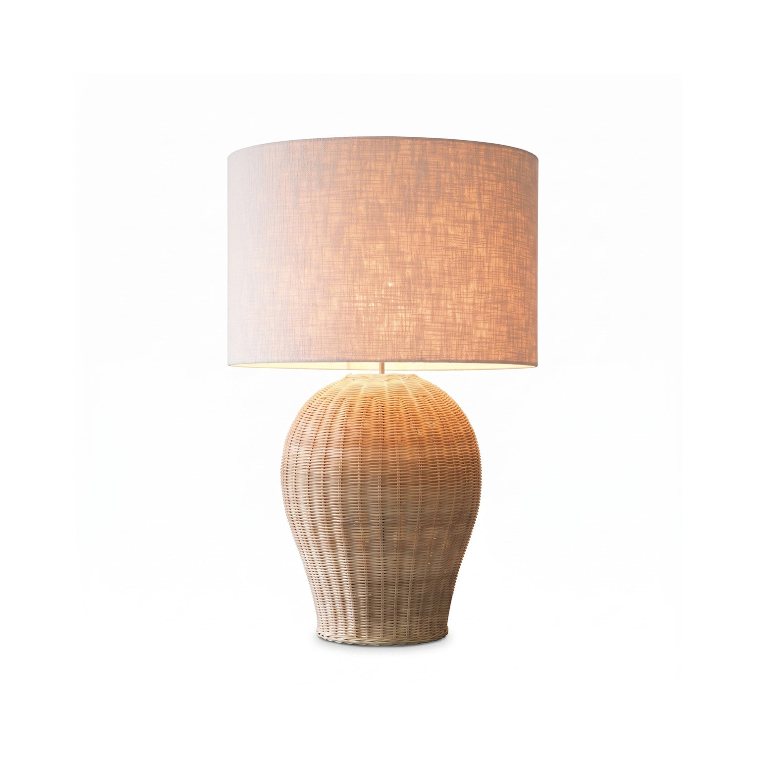 Saona Rattan Table Lamp with a natural finish and white shade.
