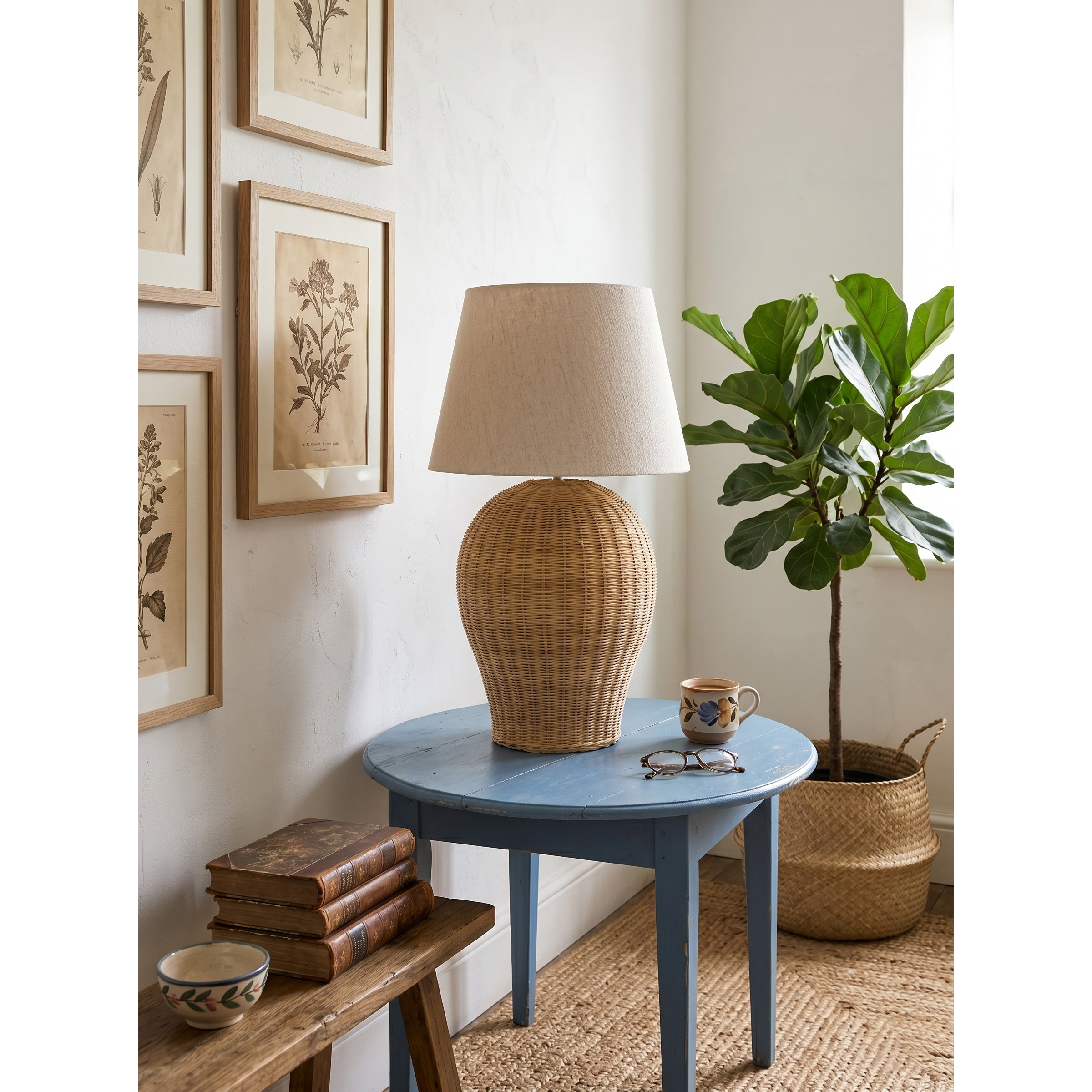 Saona lamp on a bedroom nightstand, creating a cozy ambiance.